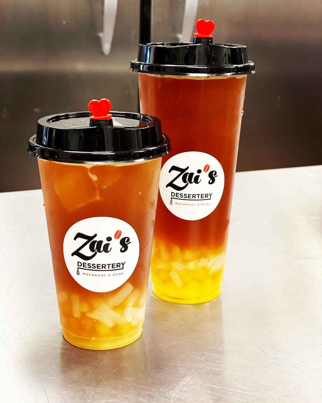 Order Passion Fruit Iced Tea food online from Zai Dessertery store, Bergenfield on bringmethat.com