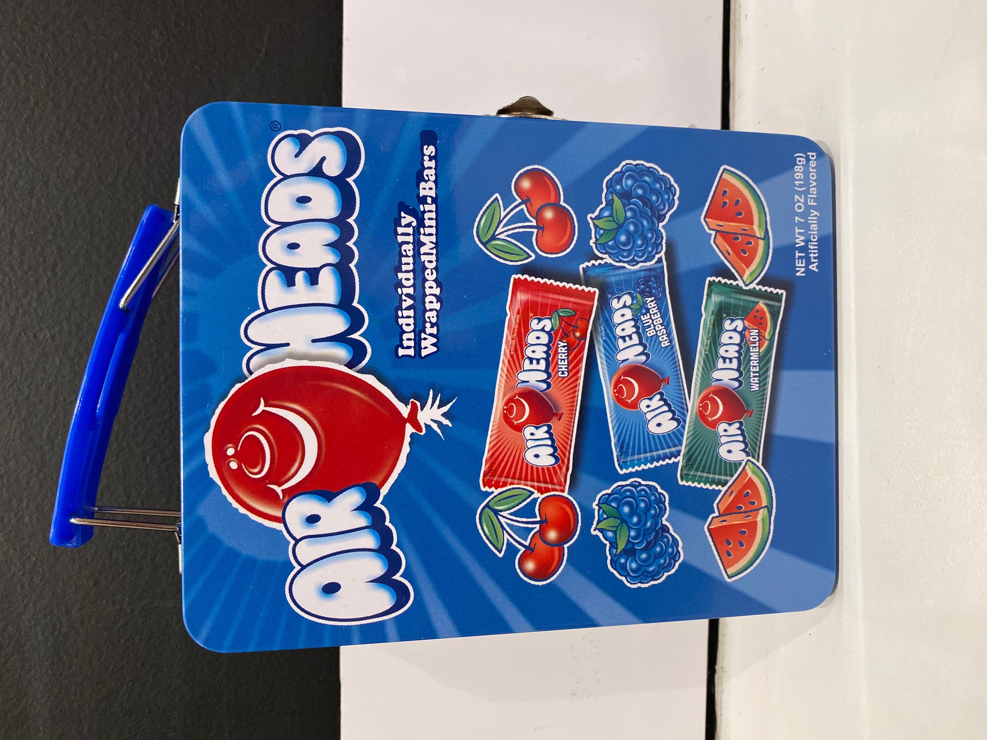 Order Air Heads Tin Lunch Box food online from Chocolate Boutique store, Pittsburgh on bringmethat.com