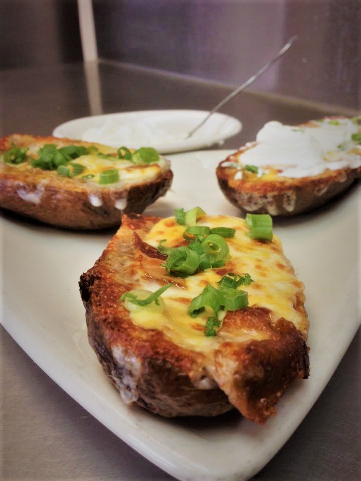 Order Loaded Potato Skins food online from Fox's Restaurant And Pub store, Oak Lawn on bringmethat.com