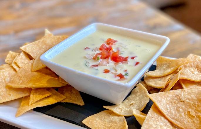 Order Poblano Queso Dip food online from Gringos & Mariachis store, Bethesda on bringmethat.com