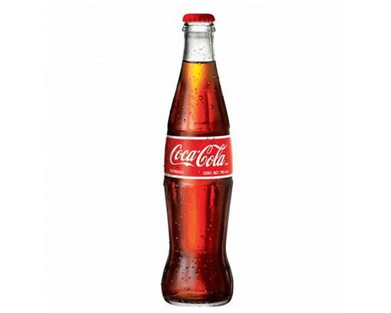 Order Mexican Coke food online from Ideal Market store, Metairie on bringmethat.com