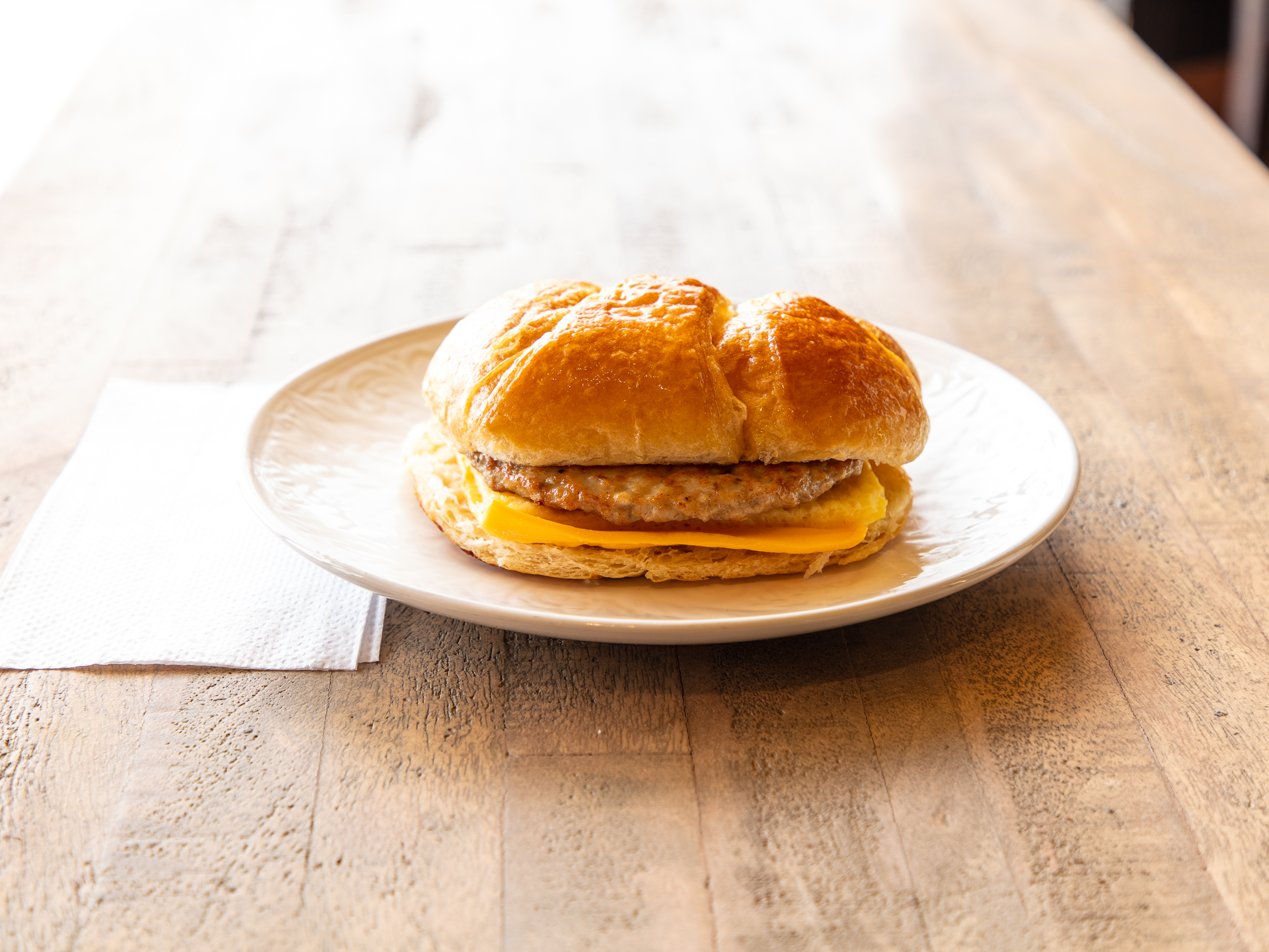 Order Sausage, Egg and Cheese Sandwich food online from Donna Donuts store, Keller on bringmethat.com