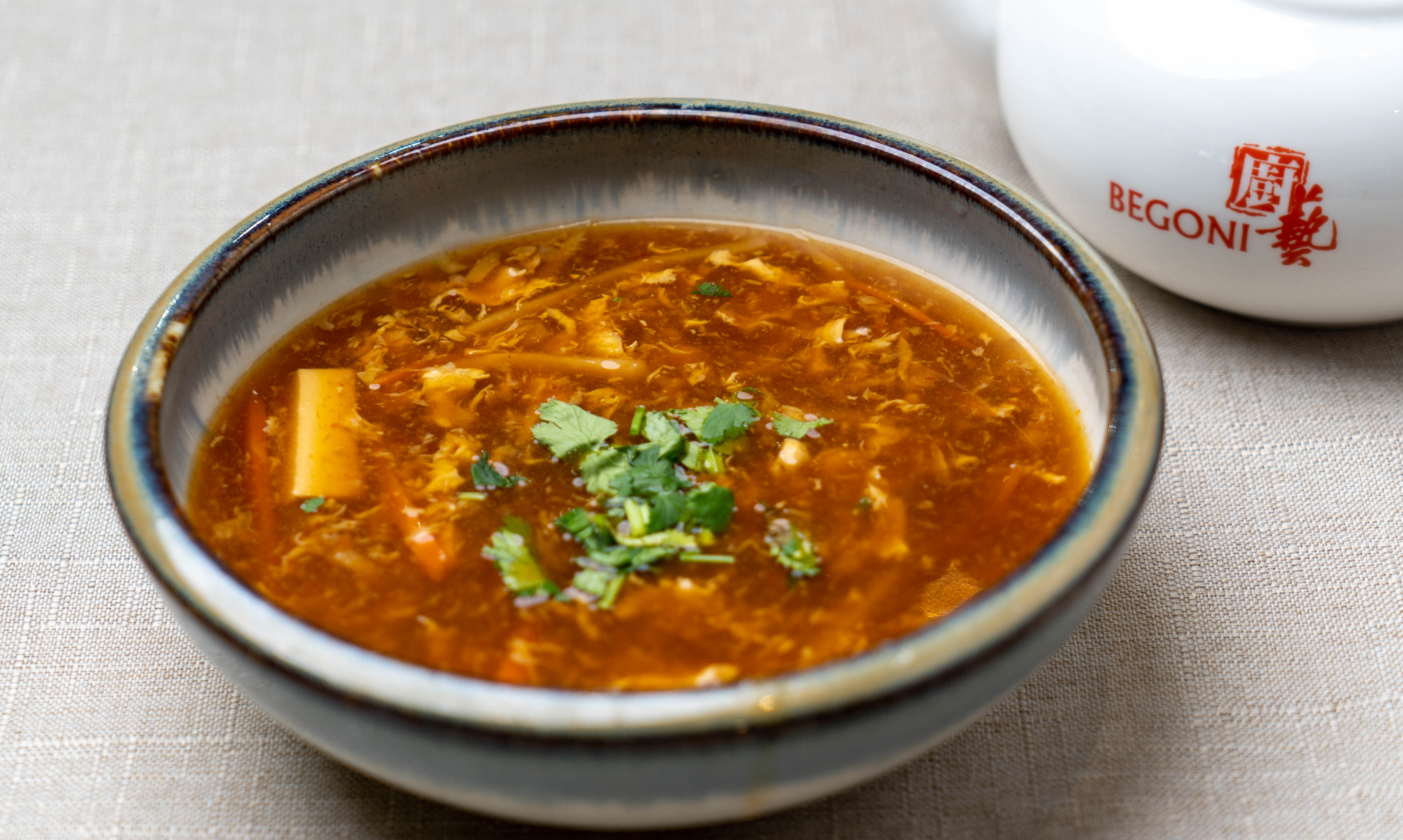 Order S1. Hot and Sour Soup food online from Begoni Bistro store, San Francisco on bringmethat.com