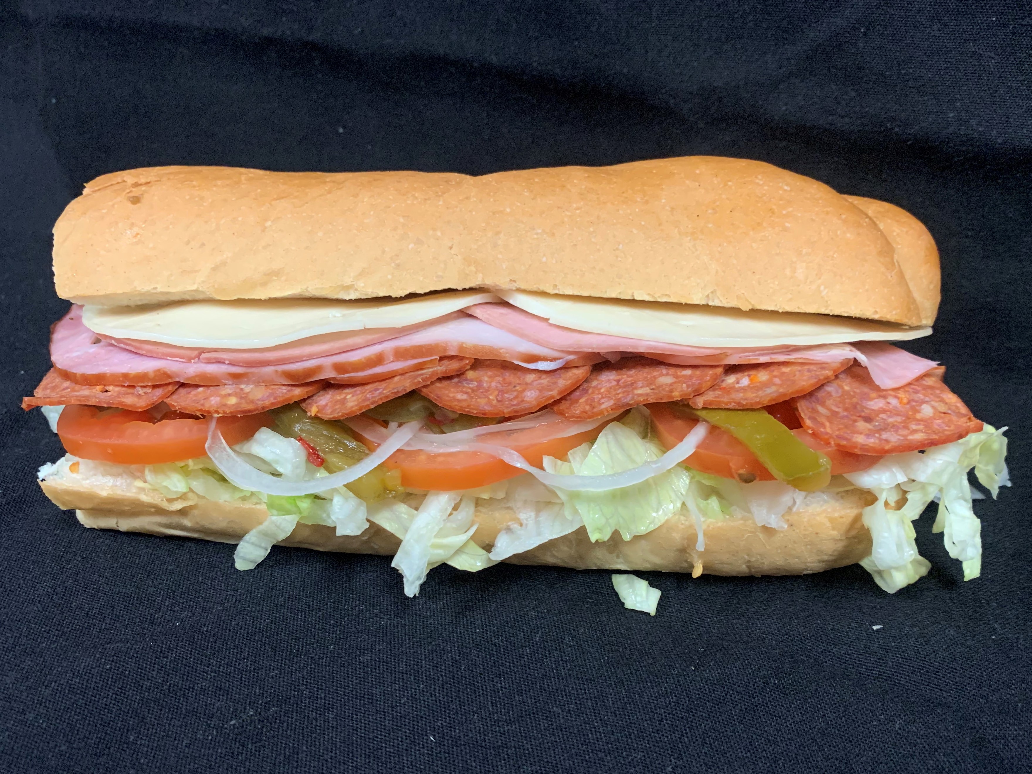 Order 3. Ham, Pepperoni, Mortedella and Cheese Sub food online from Tony Subs & Pizza store, Inglewood on bringmethat.com