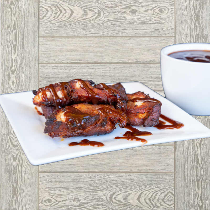 Order 1/2 lb. Smoked BBQ Ribs food online from Big Daddy's Pizza store, West Valley City on bringmethat.com