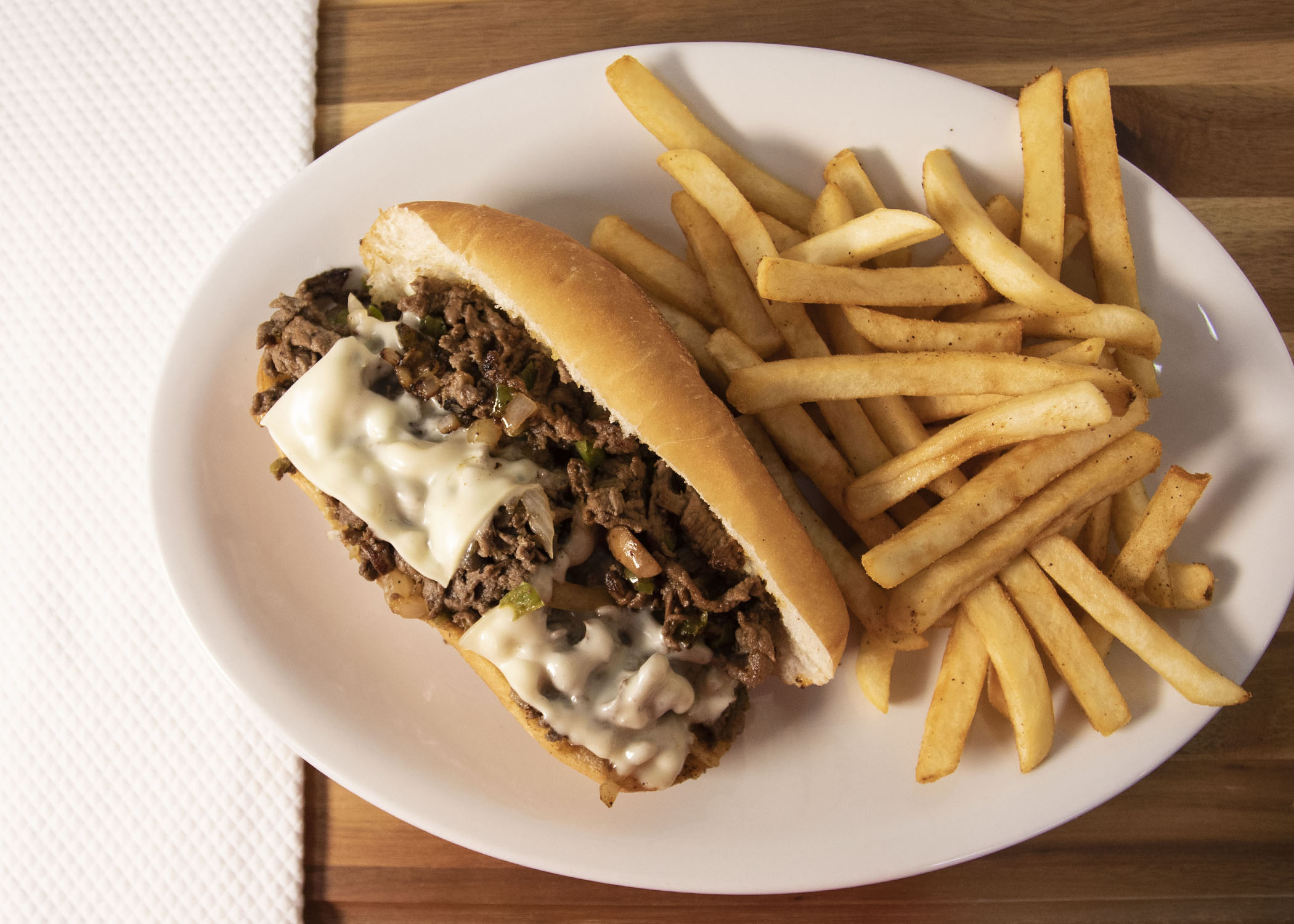 Order Philly Cheese Steak Combo food online from Steak & Bake store, Tulsa on bringmethat.com