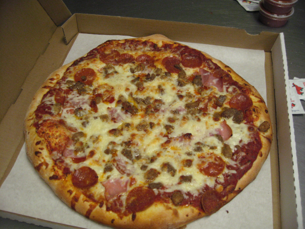 Order Meat Lovers Pizza food online from Papas Pizza store, San Diego on bringmethat.com