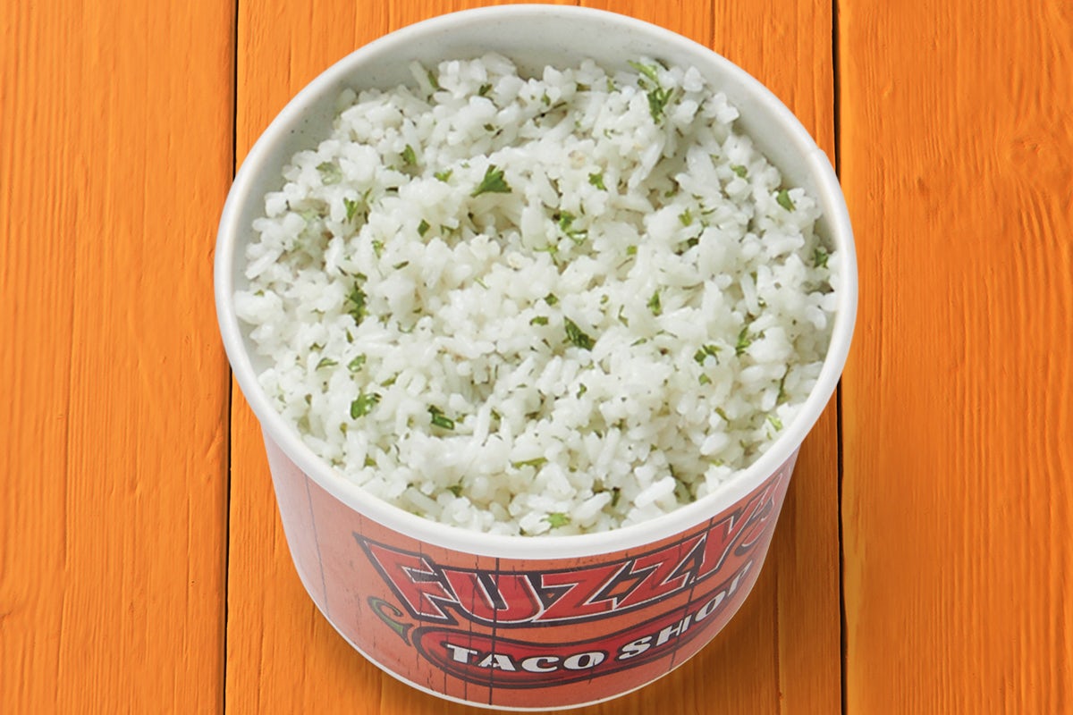 Order Cilantro-Lime Rice food online from Fuzzys Taco Shop store, Arlington on bringmethat.com