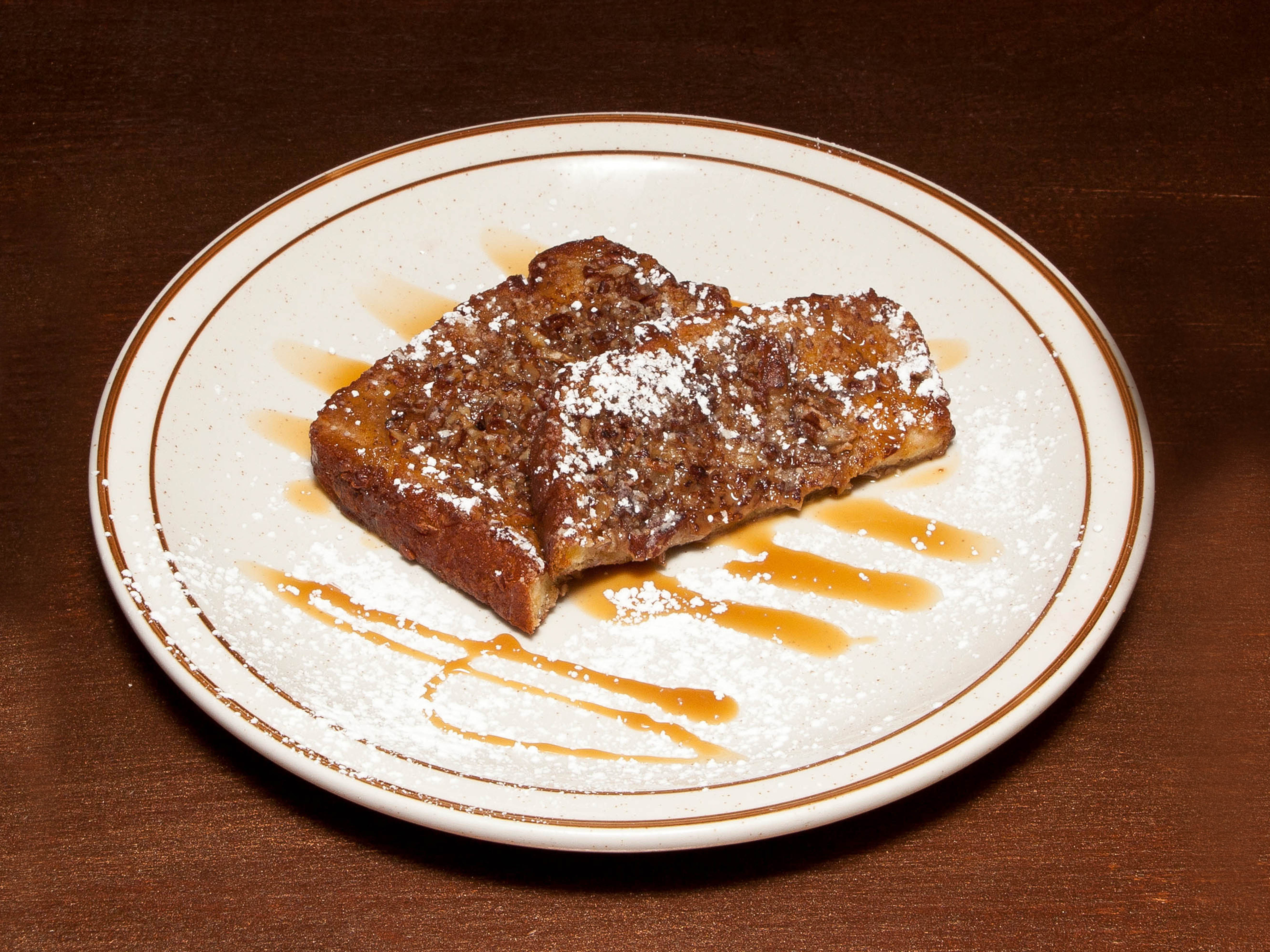 Order The nutty  french toast food online from Divine Eatery store, Las Vegas on bringmethat.com