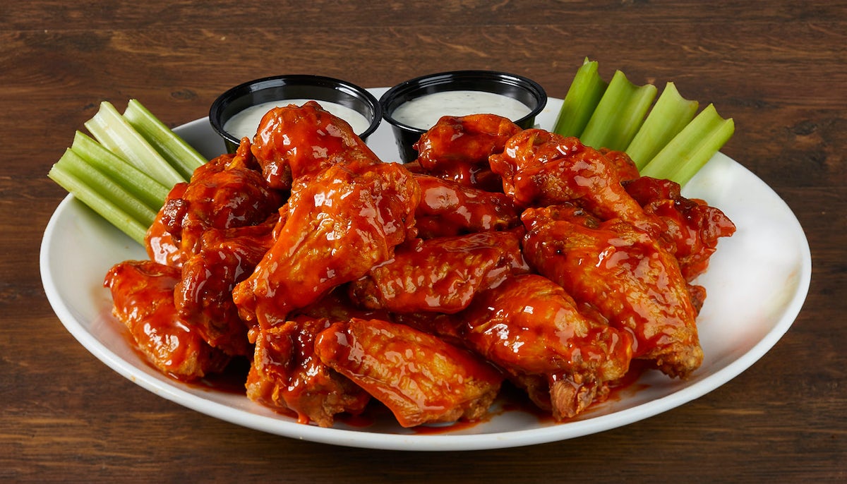 Order FRESH CHICKEN WINGS- 24 WINGS food online from Miller's Ale House store, Levittown on bringmethat.com