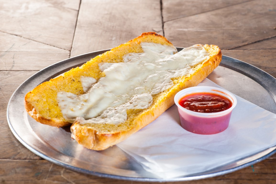Order Garlic Parmesan Cheese Toast with Sauce food online from Mama's Famous Pizza & Heros store, Tucson on bringmethat.com