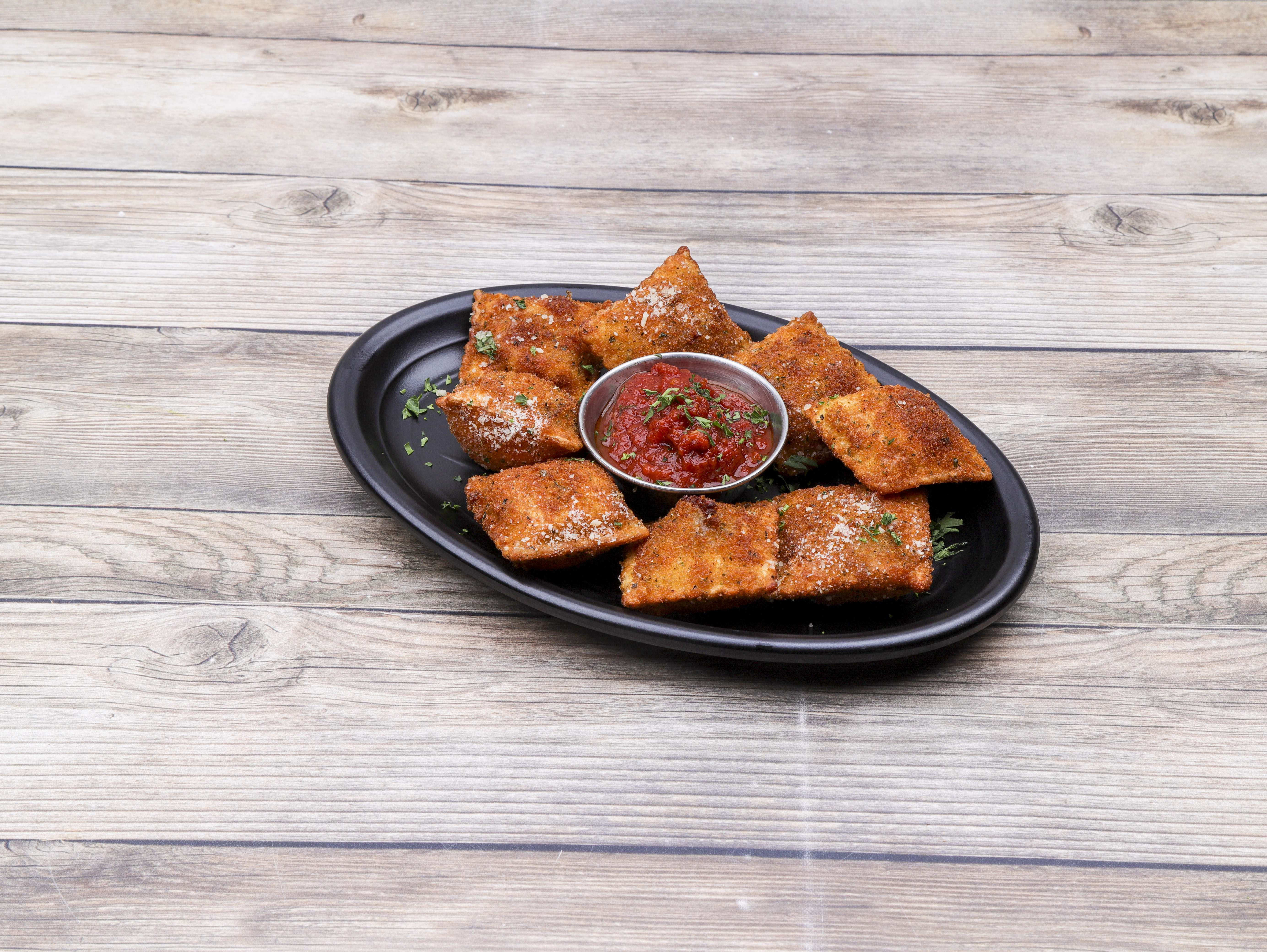 Order Toasted Ravioli food online from Cafe Piazza  store, Saint Louis on bringmethat.com