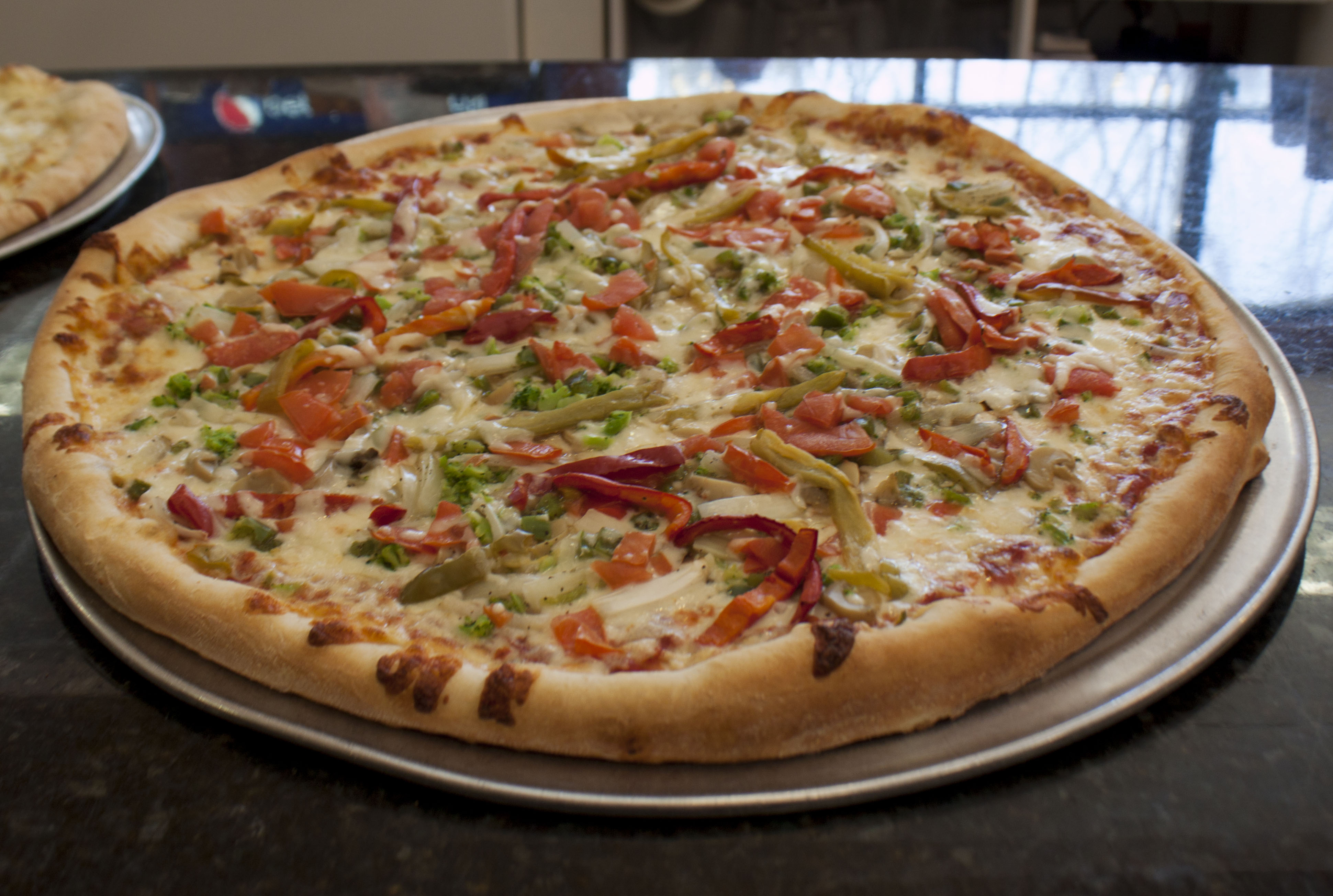 Order Veggie Lover's Pizza food online from Kasa Pizza store, Cresco on bringmethat.com