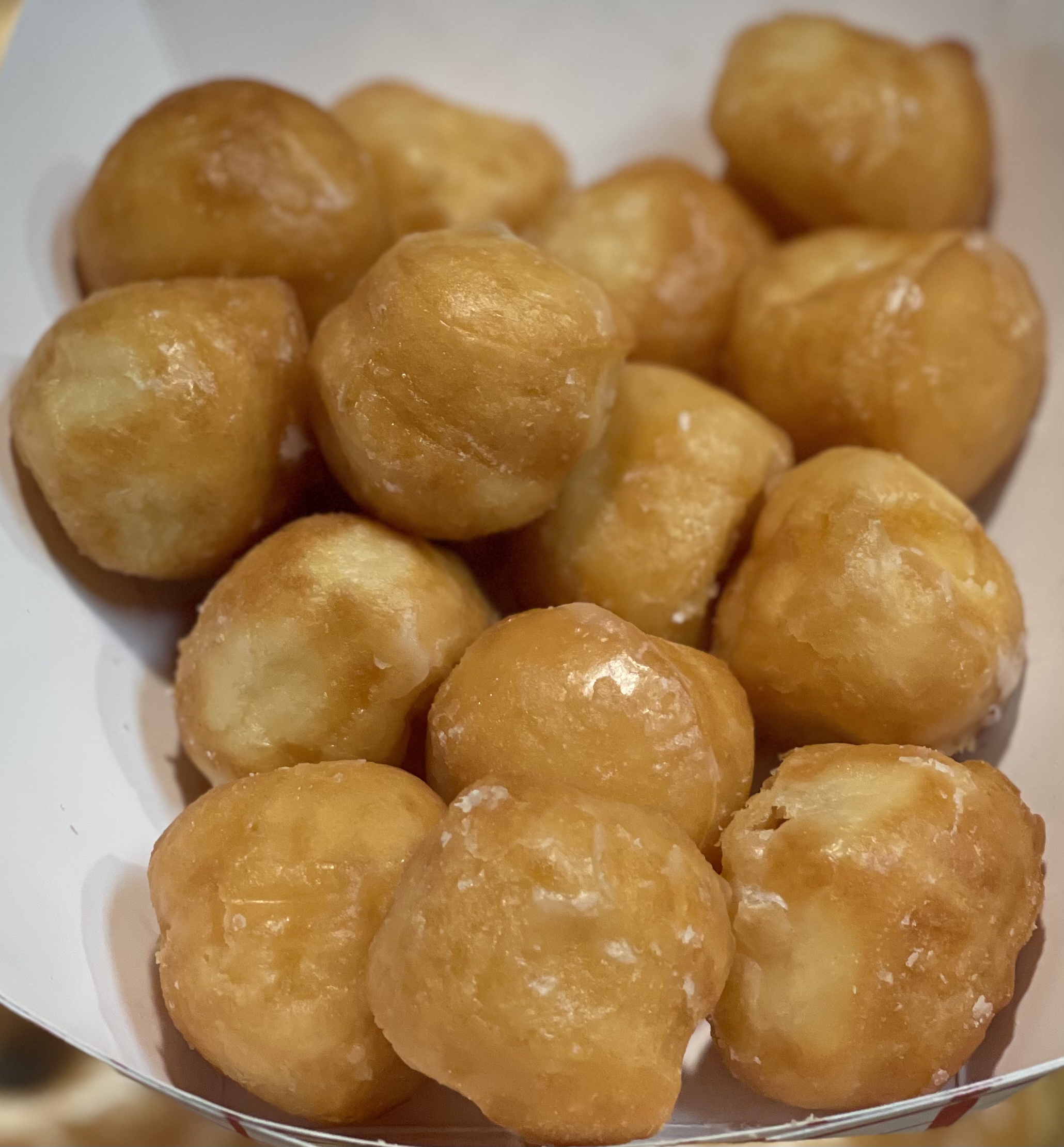 Order Dozen of Donut Holes food online from Glaze Donuts store, Ceres on bringmethat.com