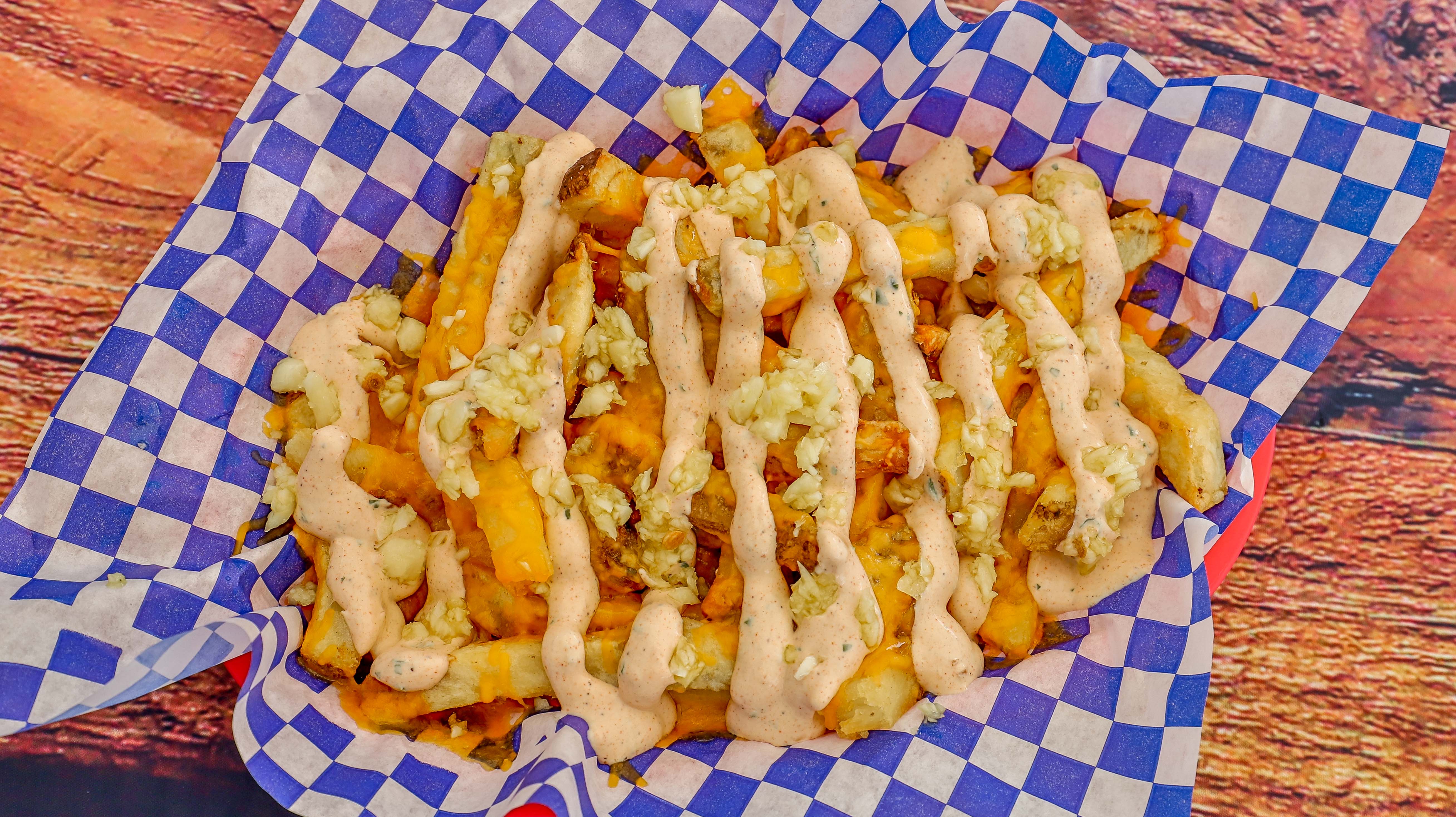 Order Fully Loaded Fries food online from The Codmother Fish & Chips store, San Francisco on bringmethat.com