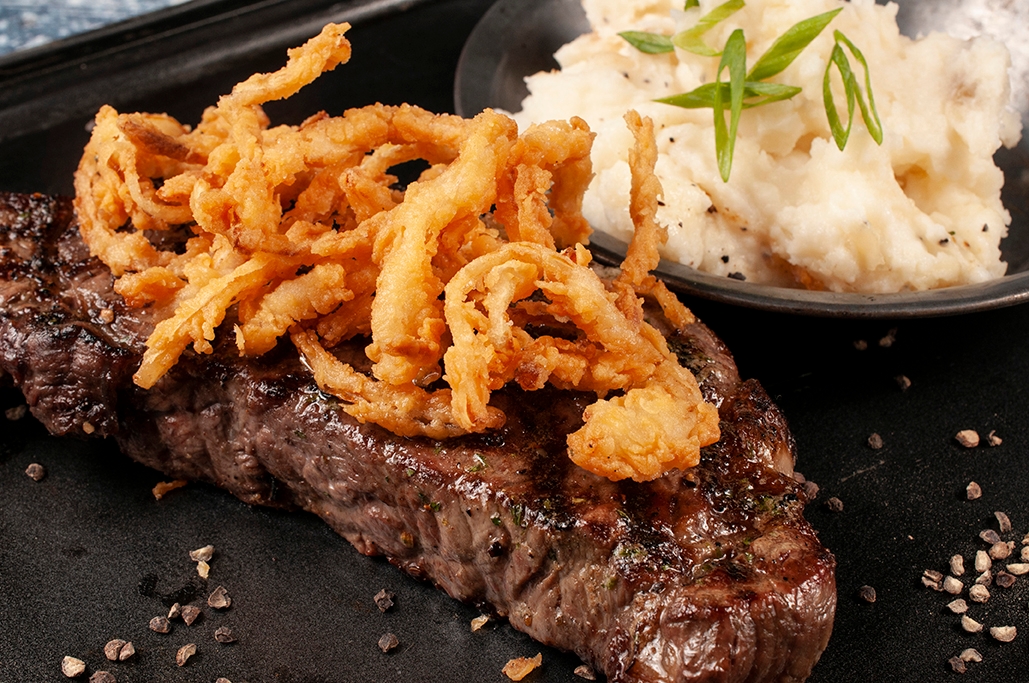 Order New York Strip Steak food online from Austin's American Grill store, Fort Collins on bringmethat.com