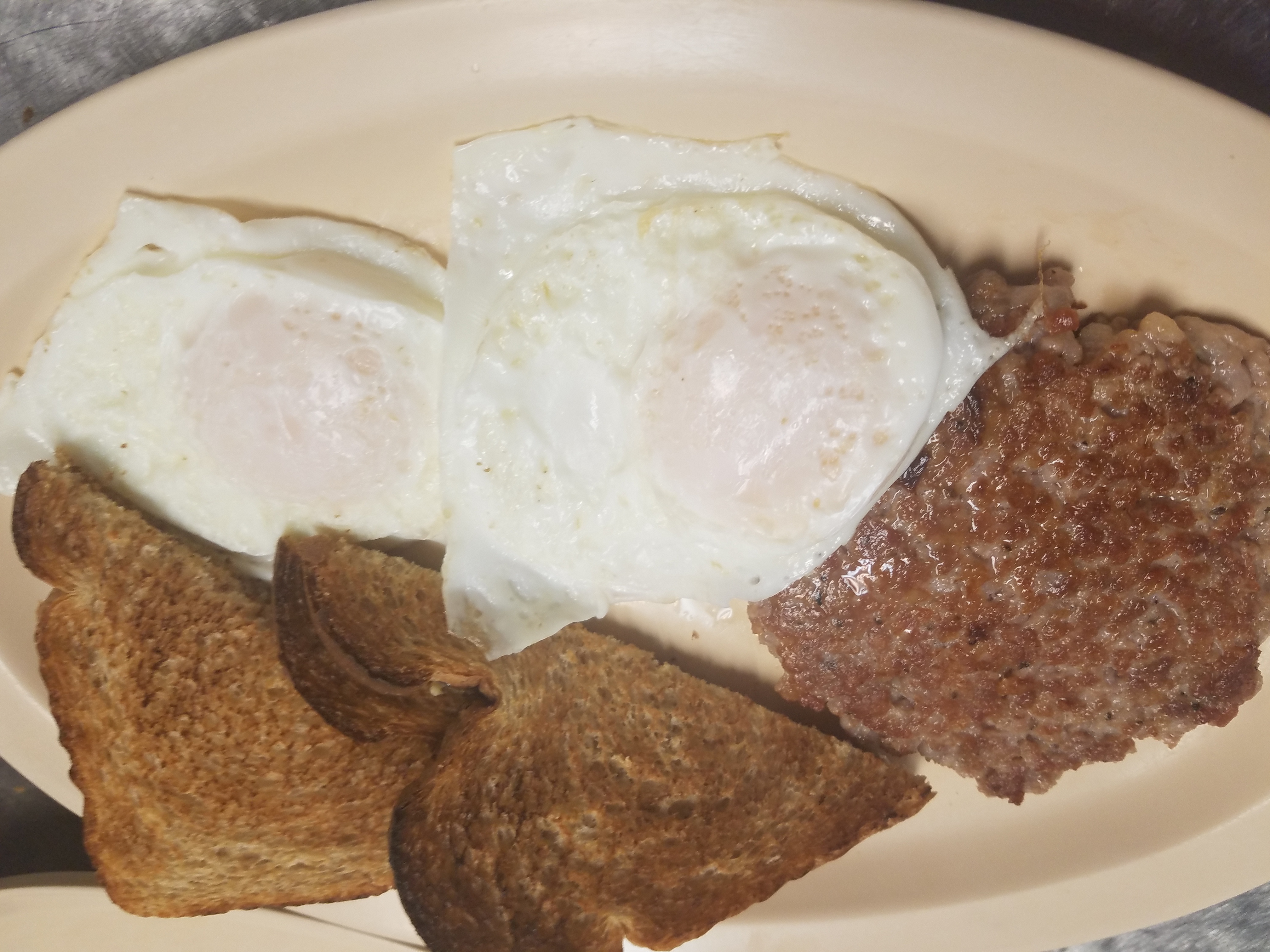 Order 2 Eggs with Meat and Toast food online from Coles Front Street Inn store, Greenville on bringmethat.com