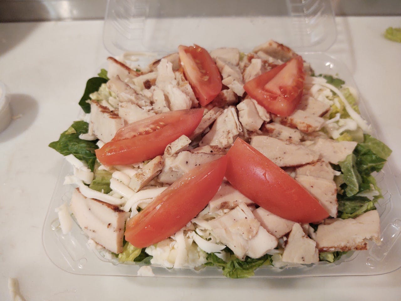Order Chicken Dinner Salad - Small food online from Poulsbo Woodfired Pizza  store, Poulsbo on bringmethat.com