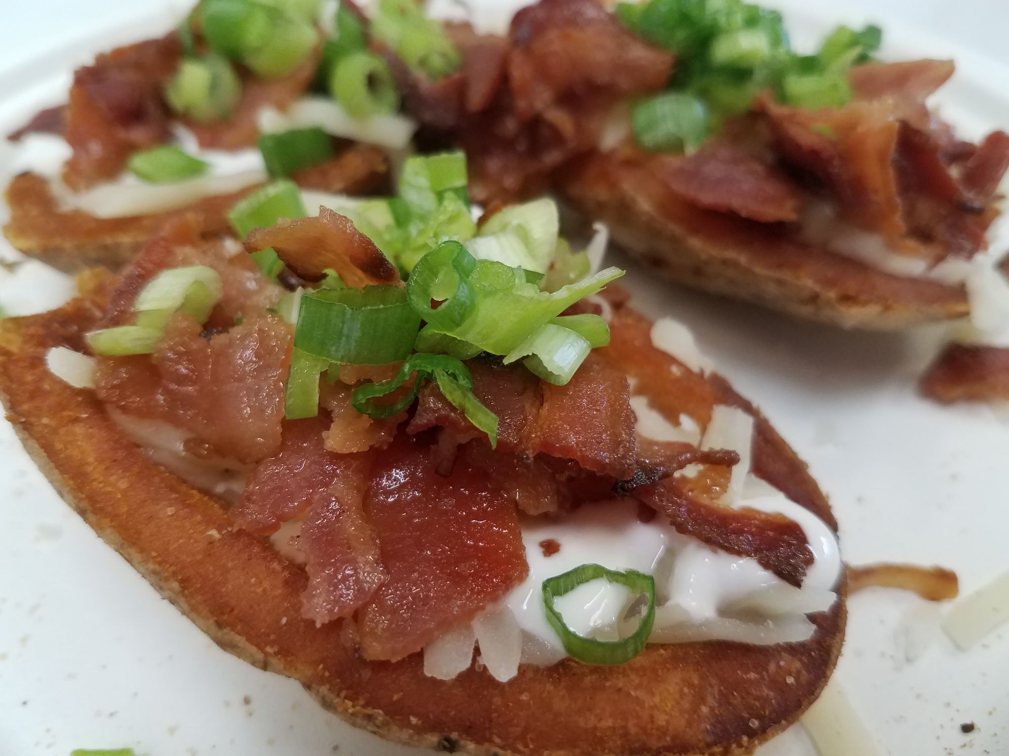 Order Loaded Potato Skins  food online from Doglicious Hot Dogs store, Glendale on bringmethat.com