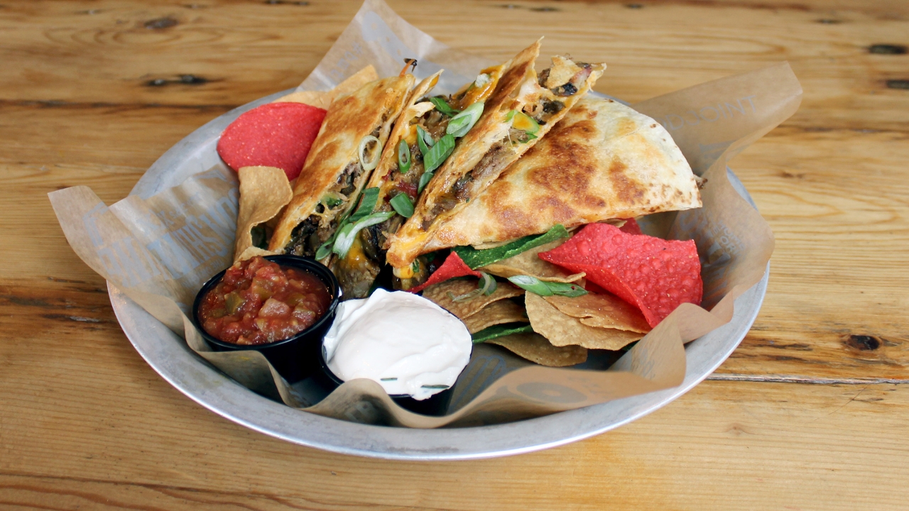 Order Moonshine Pork Quesadilla food online from Junior's Bar and Grill store, Albany on bringmethat.com