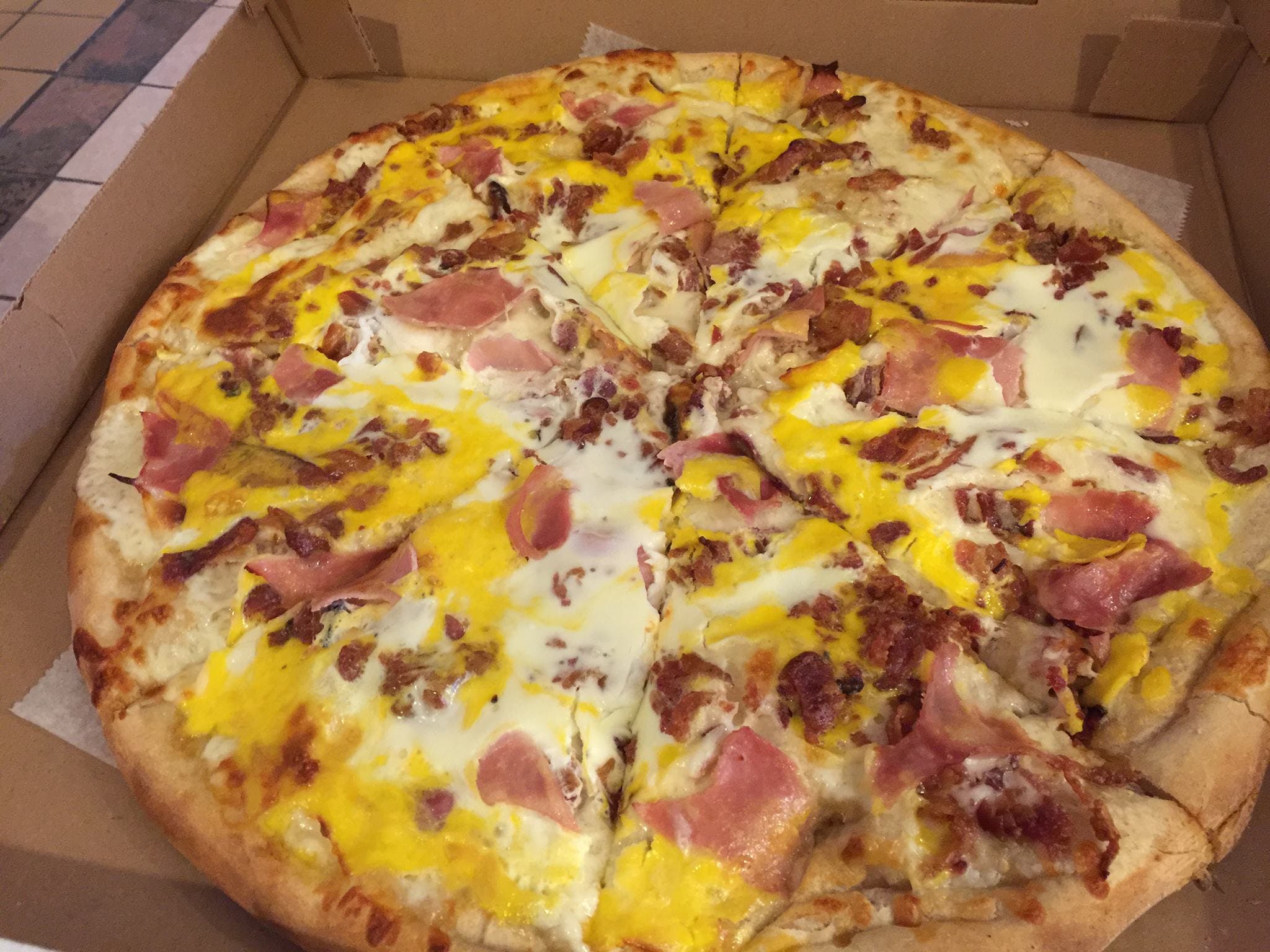 Order Breakfast Pizza - Medium 14'' (6 Slices) food online from Cafe Lark store, Albany on bringmethat.com