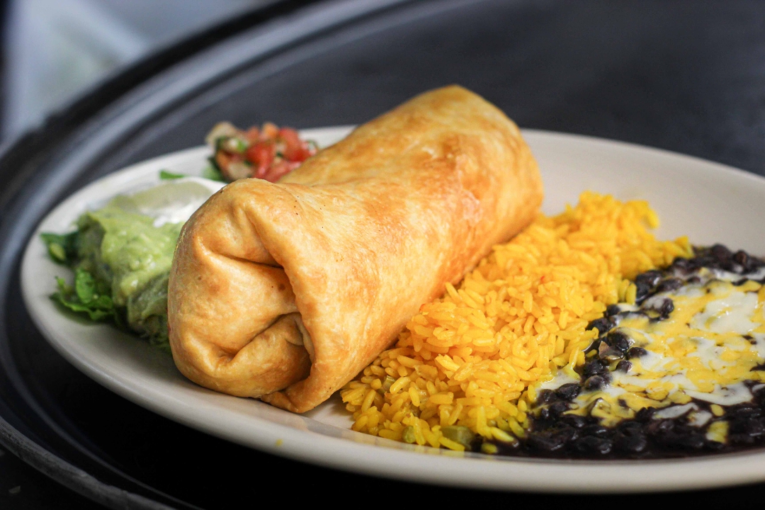 Order CHIMICHANGA* food online from El Mariachi store, Rockville on bringmethat.com