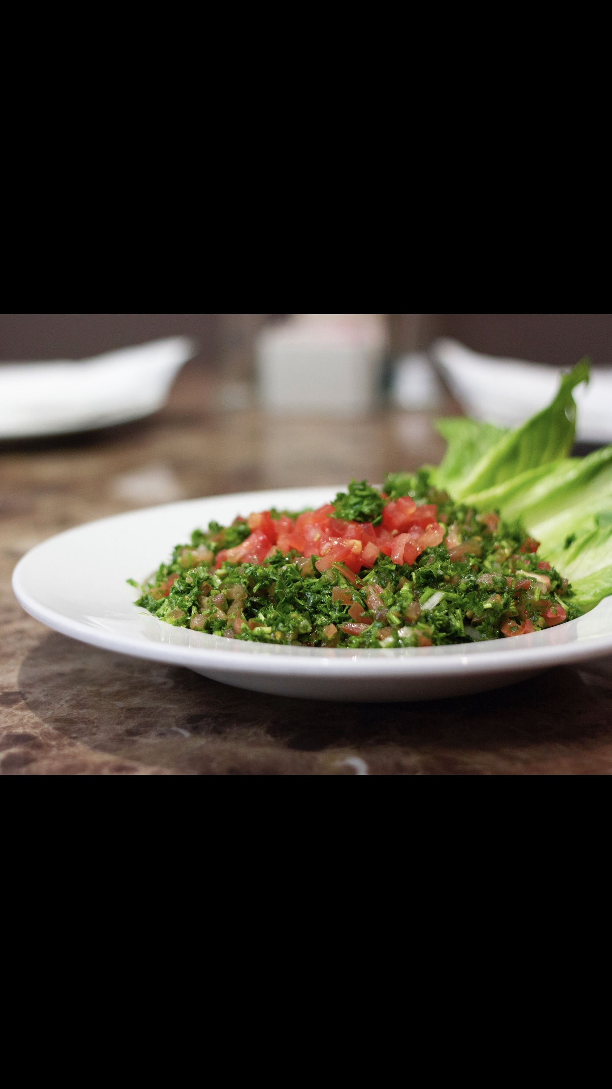 Order Tabbouleh Salad food online from Esso Mediterranean Bistro store, Encino on bringmethat.com