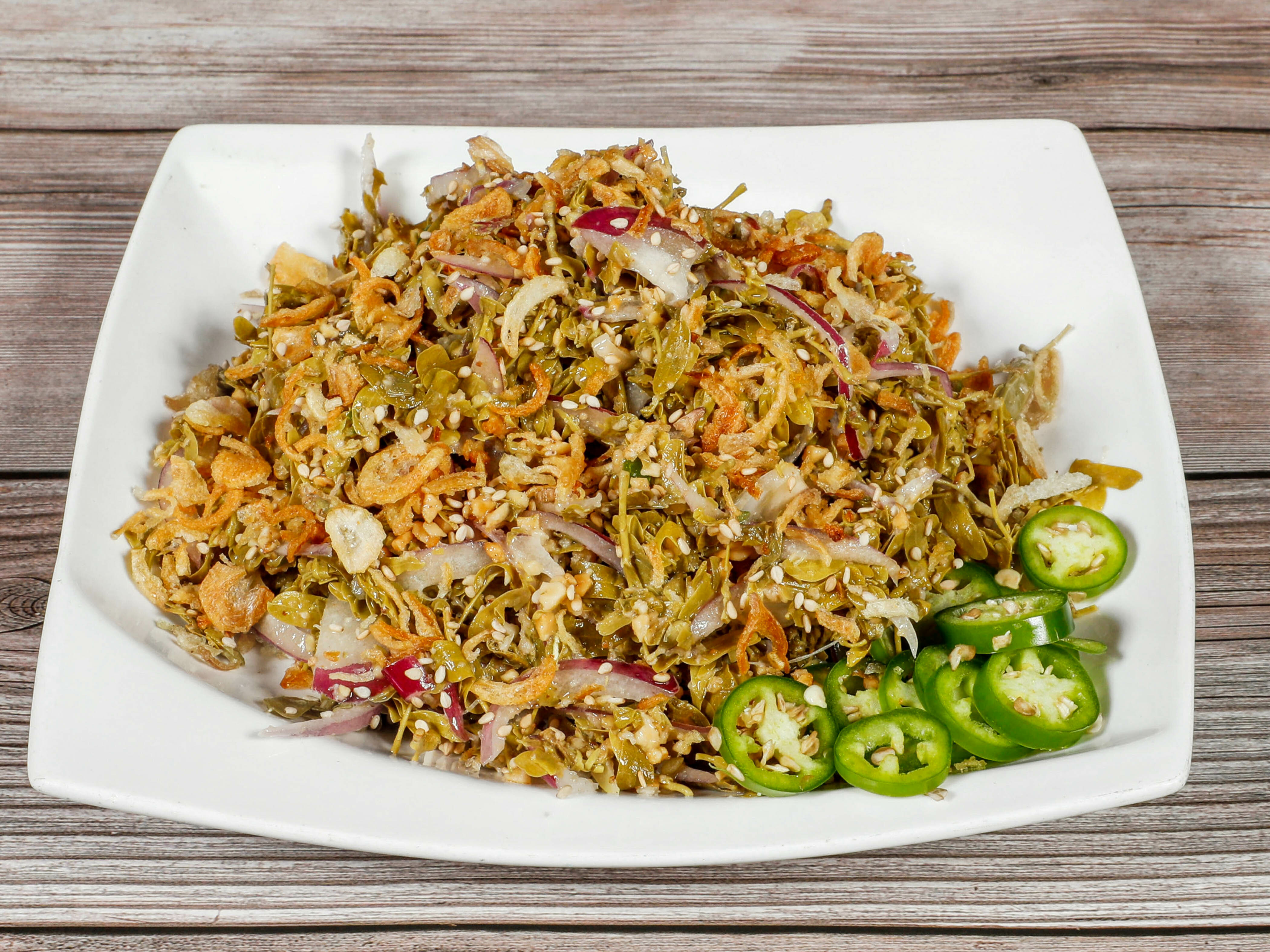 Order Tamarind Leaf Salad food online from Burmese Kitchen store, San Francisco on bringmethat.com