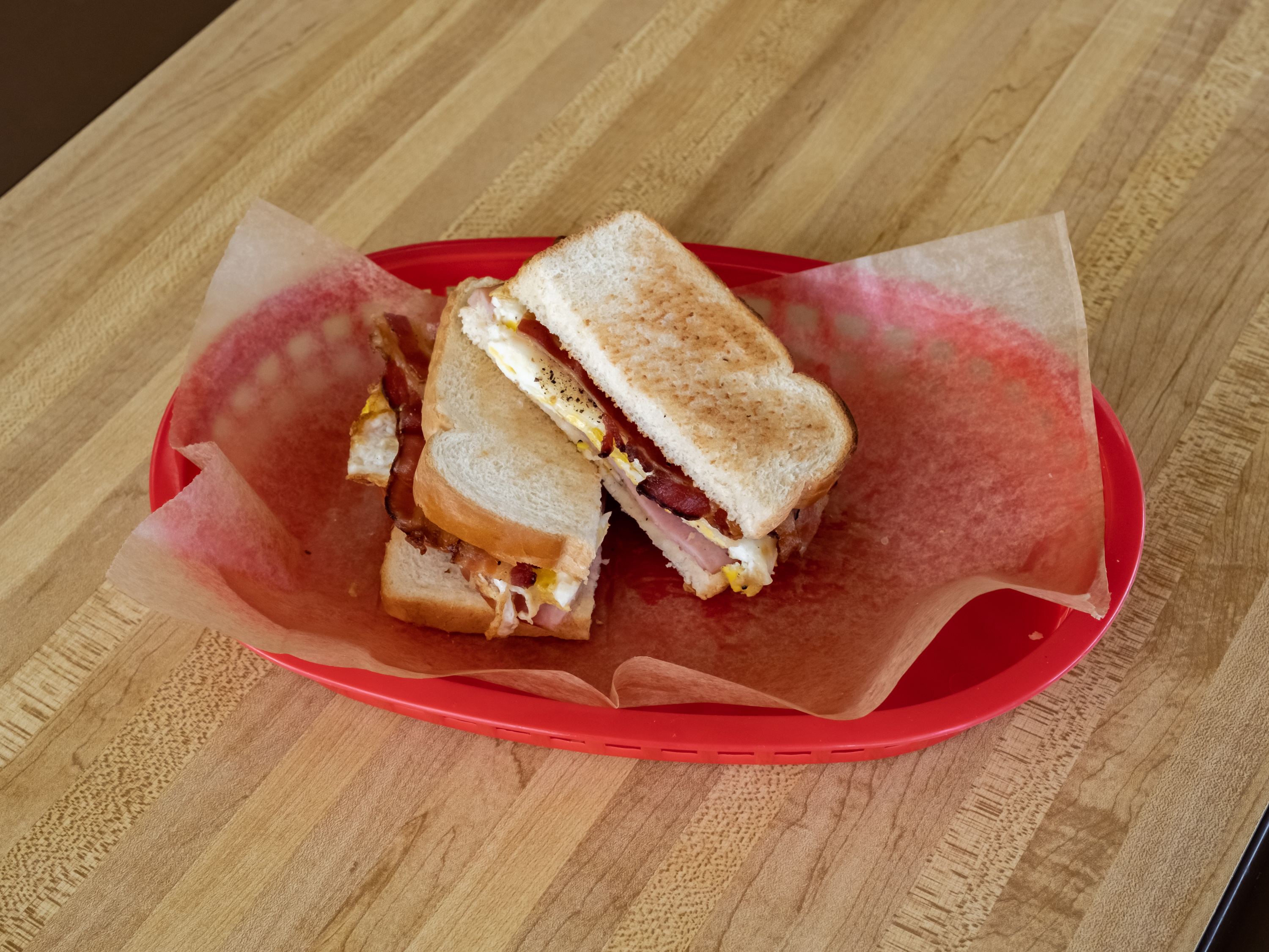 Order #20. Ham, Egg, Bacon and cheese. Toast  food online from Donut Plus store, Orange on bringmethat.com