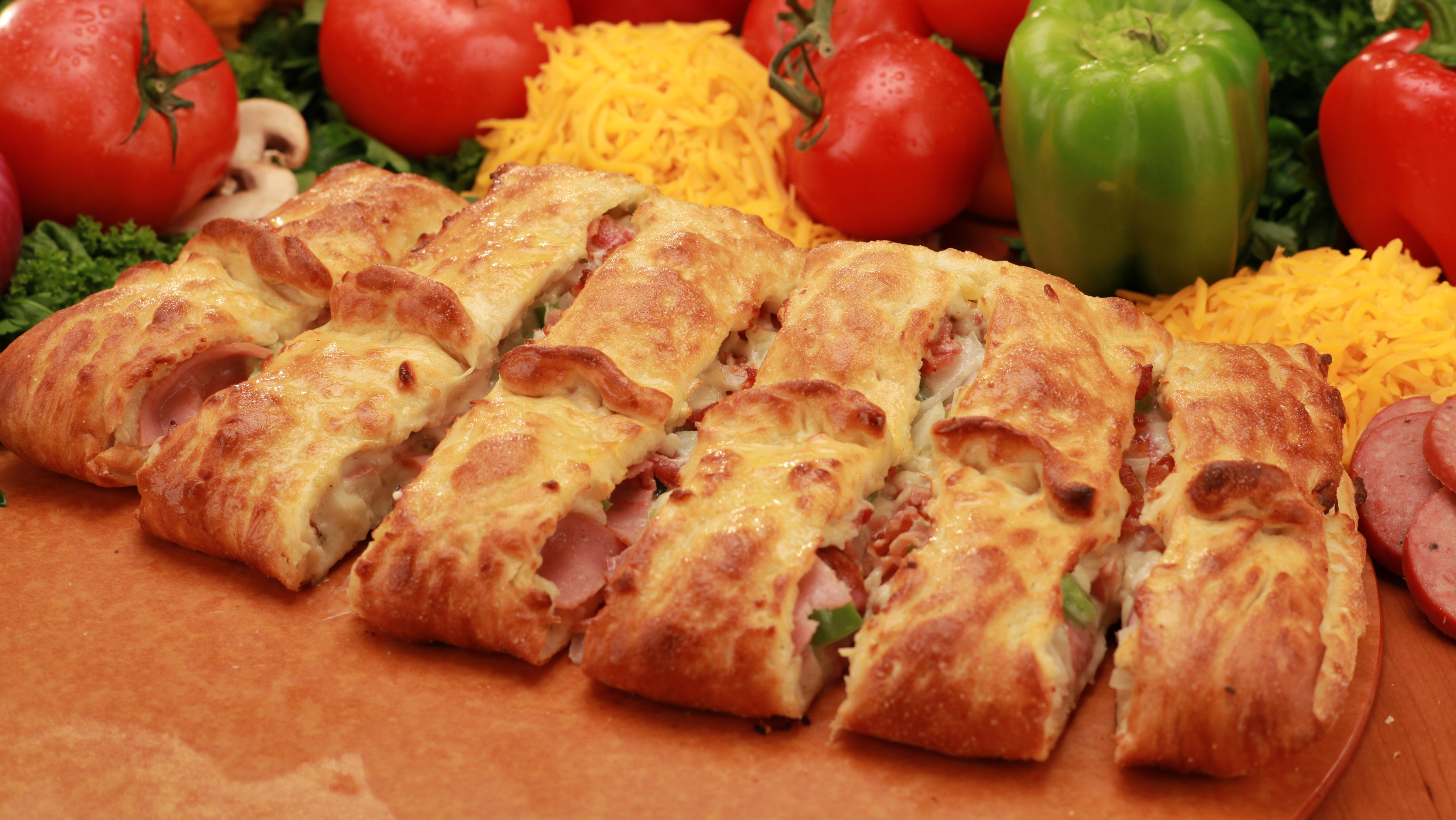 Order Stromboli food online from Cheezie Pizza store, Wichita on bringmethat.com