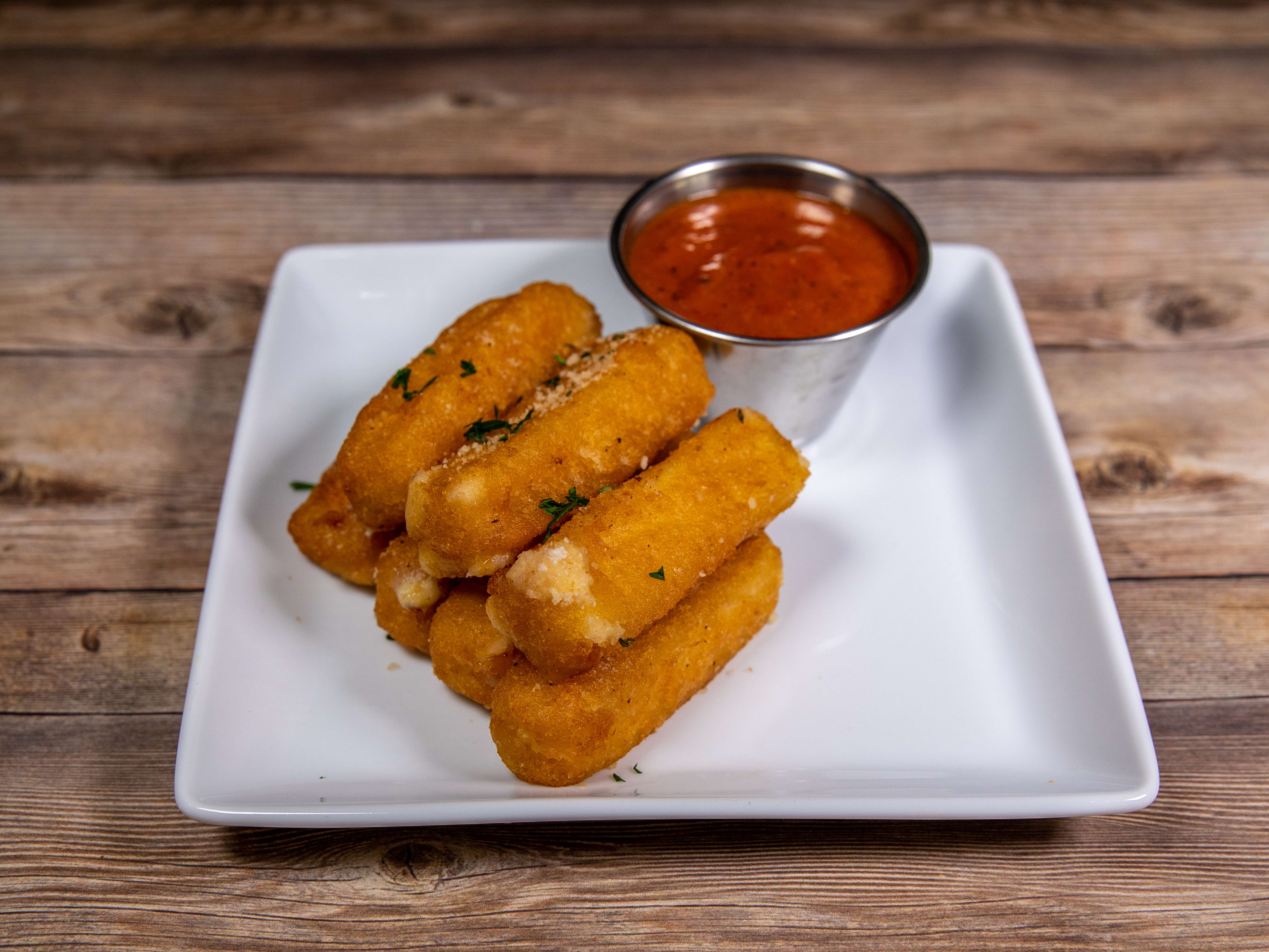 Order 7 Piece Fried Cheese Sticks food online from Romas Italian Bistro store, Grand Prairie on bringmethat.com