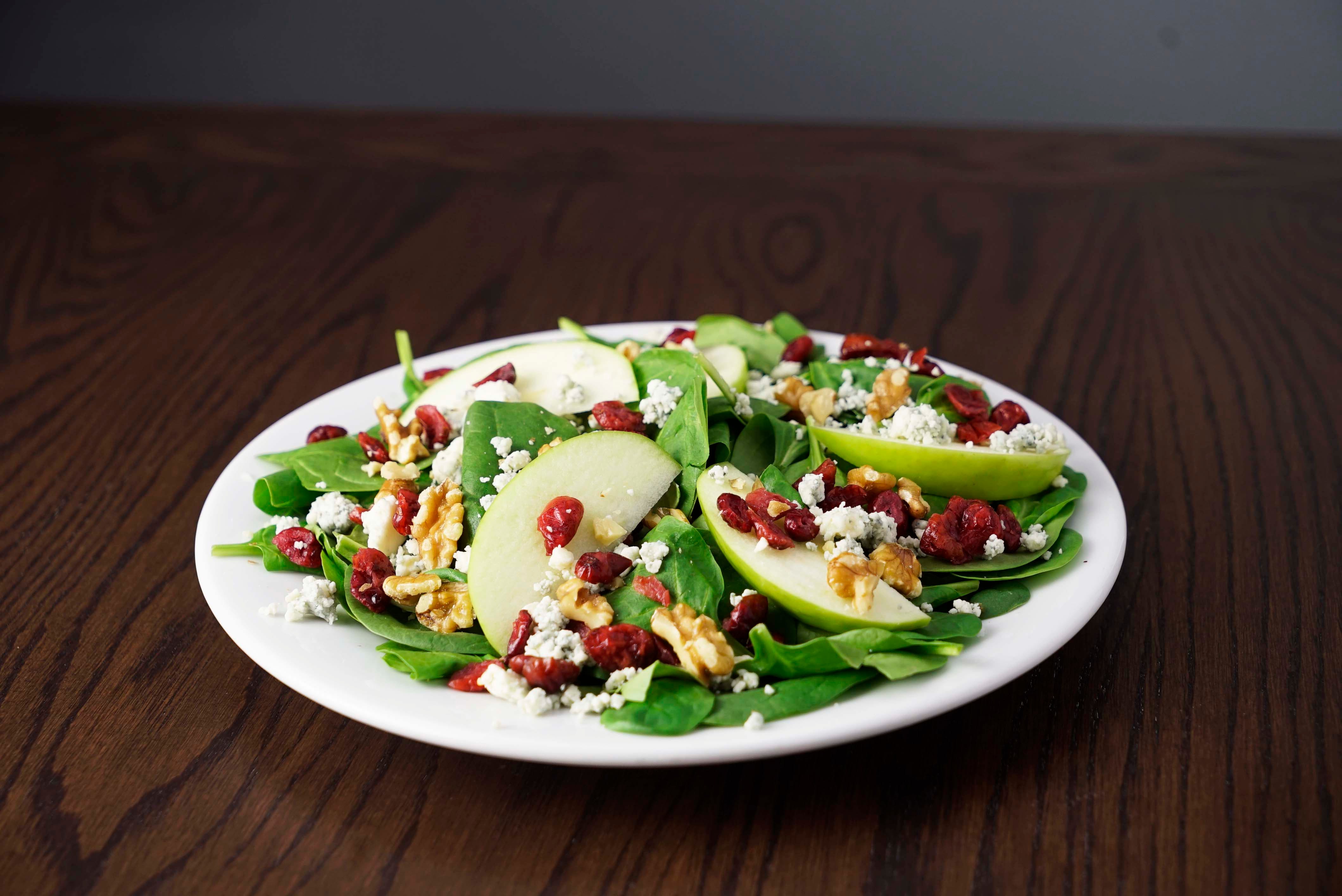 Order Spinach Gorgonzola Salad Catering - Half Tray food online from Rosati store, Prescott on bringmethat.com