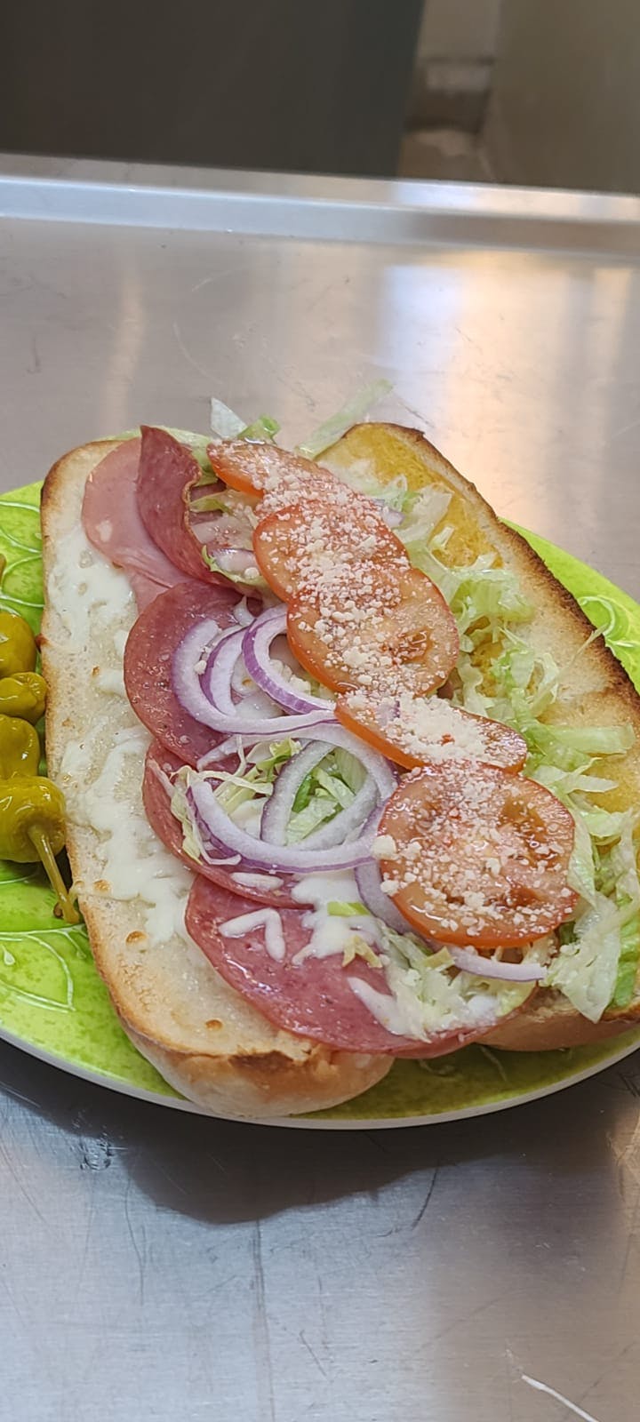 Order Torpedo Sandwich - 12'' food online from De Angelo Pizzería store, San Diego on bringmethat.com