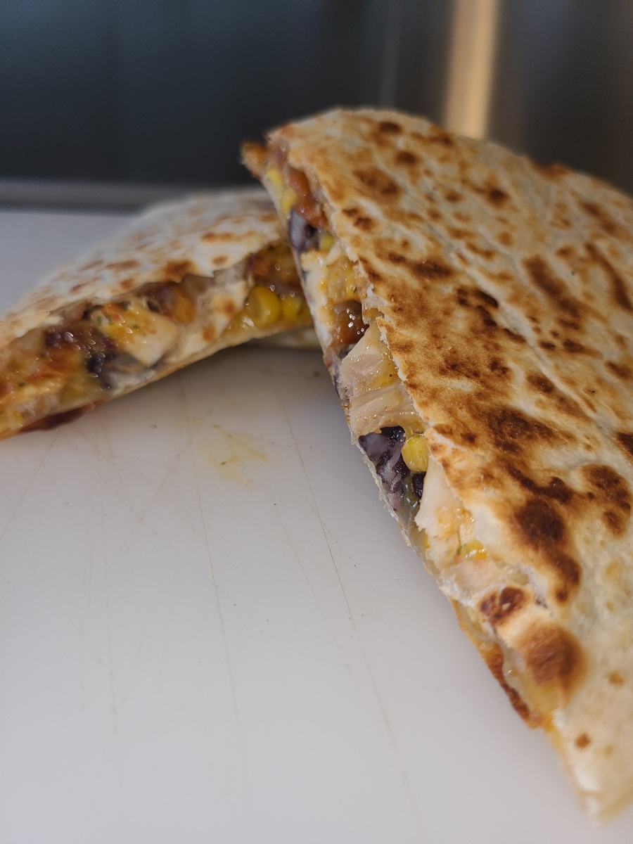 Order Sante Fe Quesadilla  food online from Coma Coffee Roasters store, Richmond Heights on bringmethat.com