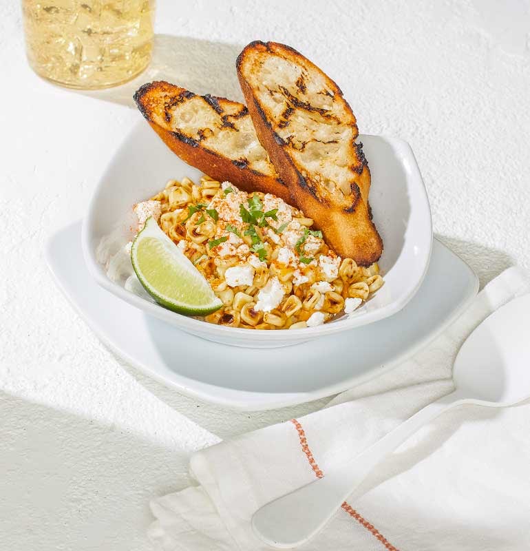 Order MEXICAN STREET CORN food online from California Pizza Kitchen store, Hollywood on bringmethat.com