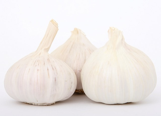 Order 8 oz. Peeled Fresh Garlic food online from Desi Galli store, New York on bringmethat.com