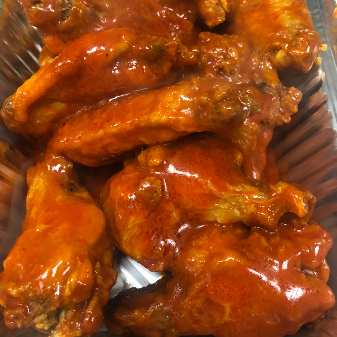 Order Hot & Spicy Buffalo Wings - 10 Pieces food online from Pino's on Main Pizza store, Rockford on bringmethat.com