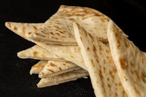 Order Extra Pita food online from Firdous Express store, Athens on bringmethat.com