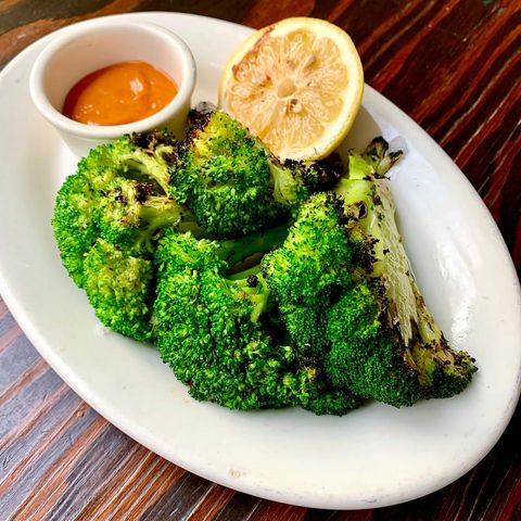 Order Wood grilled Broccolini food online from All Acqua Restaurant store, Los Angeles on bringmethat.com