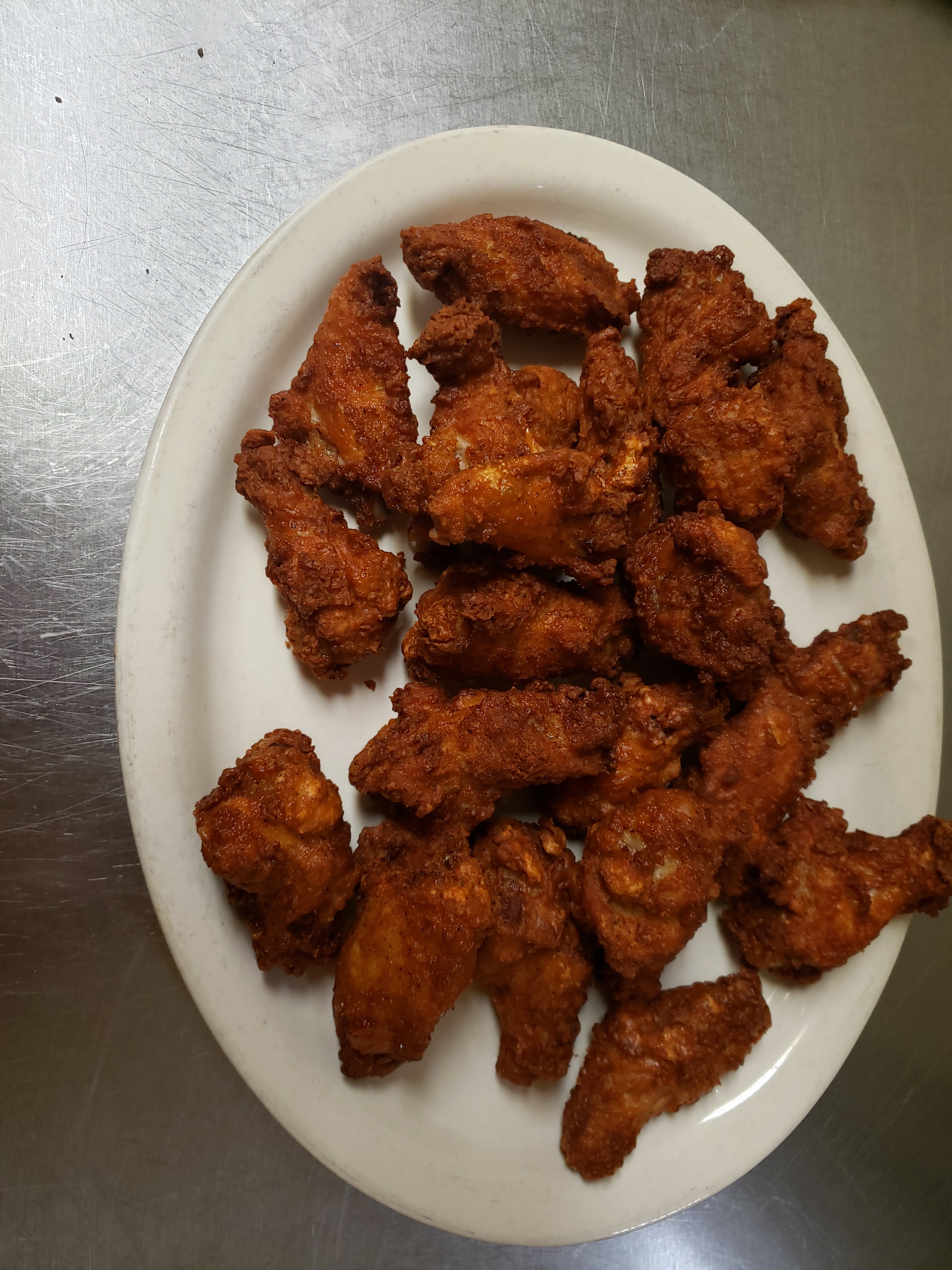 Order Bone-In Wings - 10 Pieces food online from Aly's Family Italian Restaurant store, Christiansburg on bringmethat.com