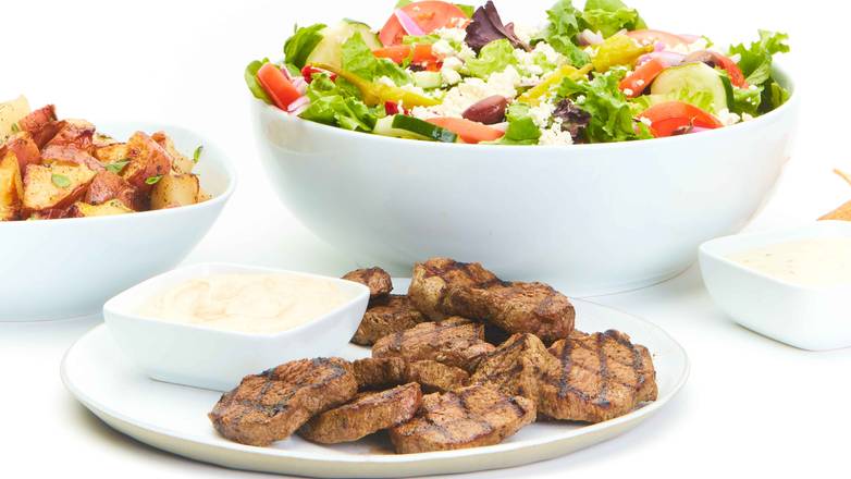 Order Grilled Beef Family Feast for 6 food online from Taziki Mediterranean Cafe store, Memphis on bringmethat.com