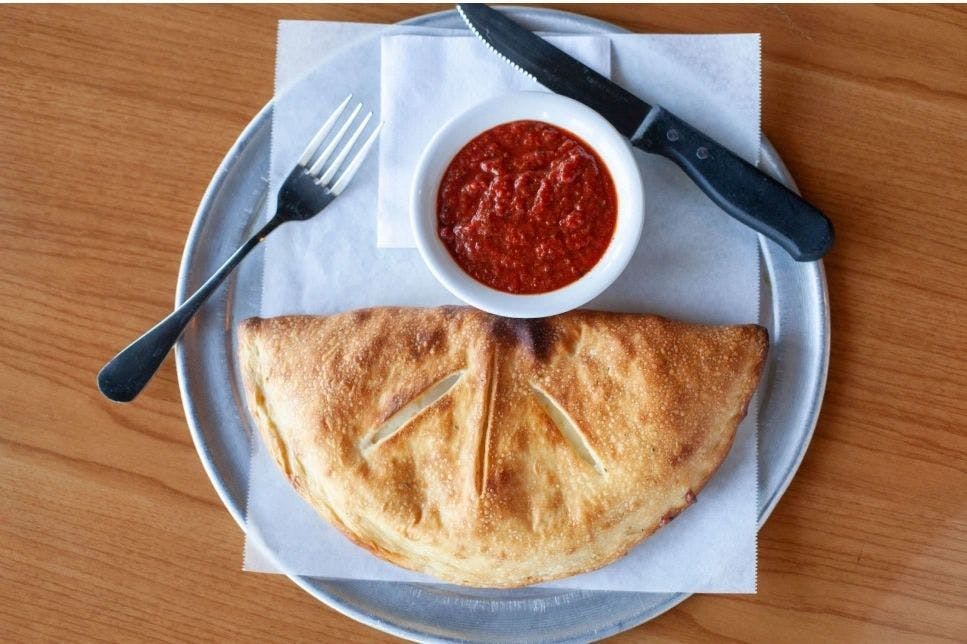 Order Calzone - Calzone food online from Rosarias Italian Kitchen store, Kennesaw on bringmethat.com