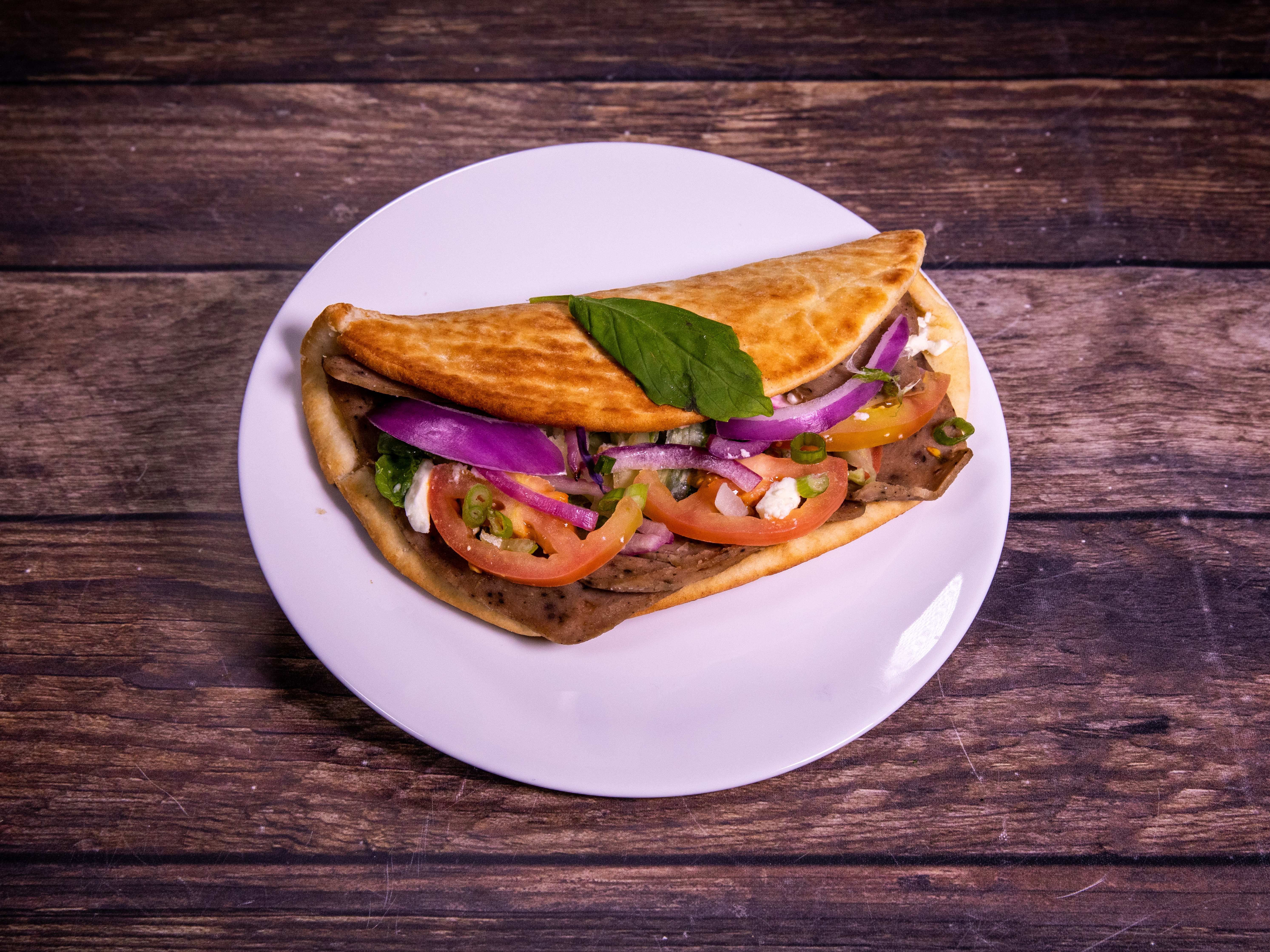 Order Greek Gyro food online from Palio Pizza Cafe store, Mckinney on bringmethat.com