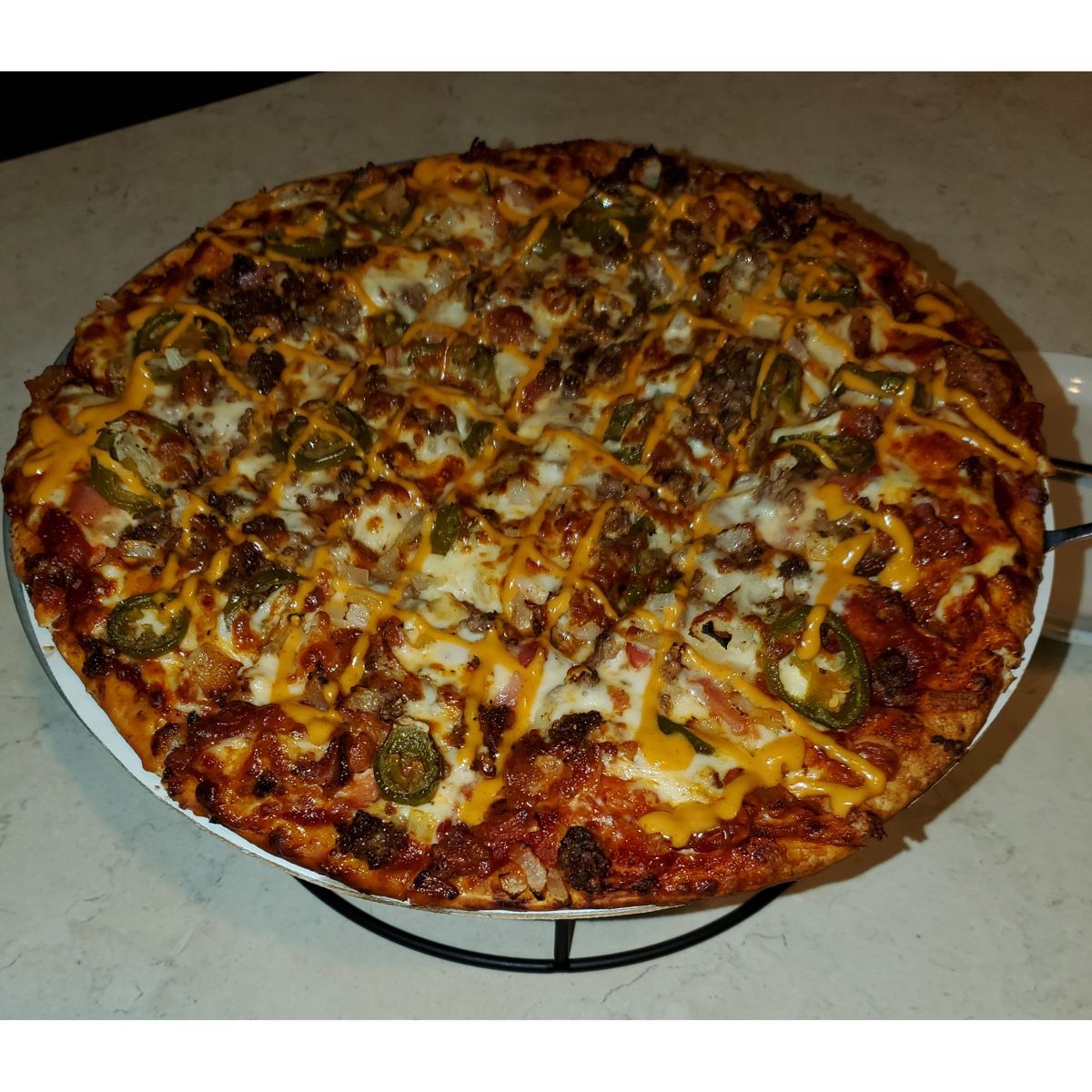 Order "The Trug Burger" Pizza food online from Community Lanes store, Minster on bringmethat.com