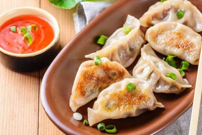 Order Pot Stickers (8 pcs) food online from Rice King Express store, South Jordan on bringmethat.com