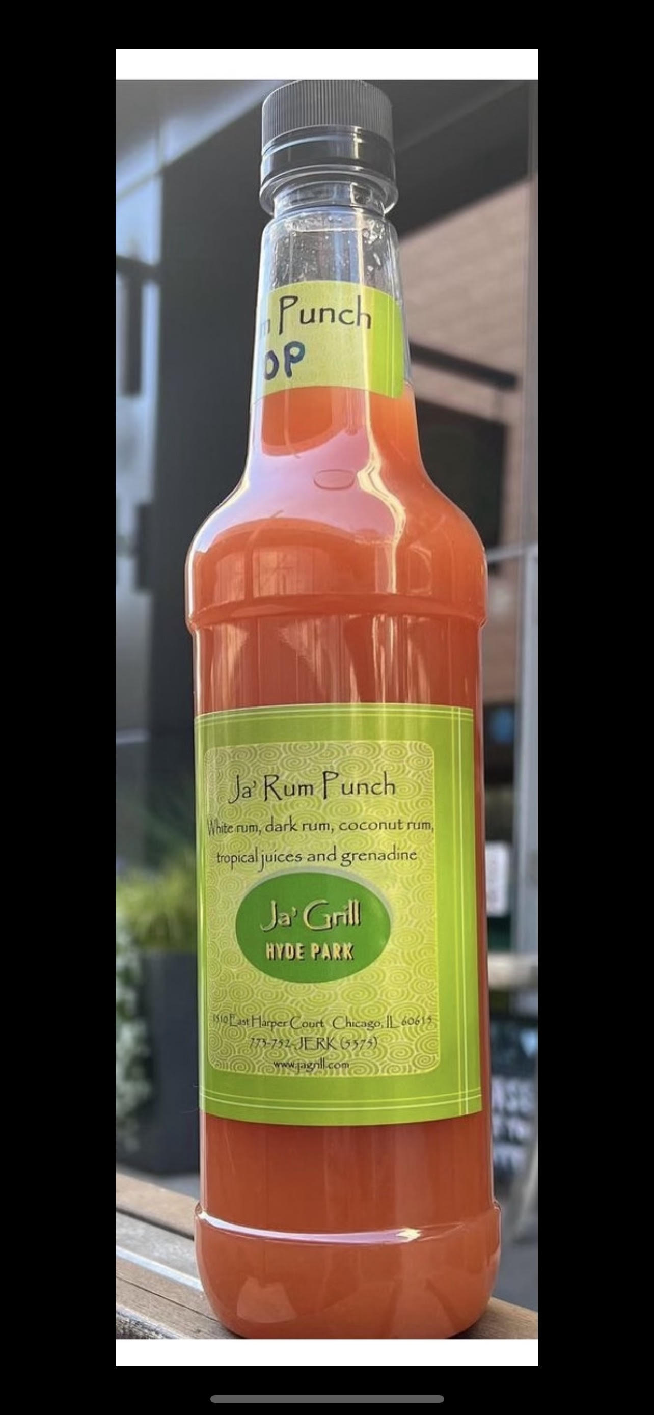 Order Ja' Rum Punch (Overproof) - 32 ounces  food online from Ja' Grill Hyde Park store, Chicago on bringmethat.com