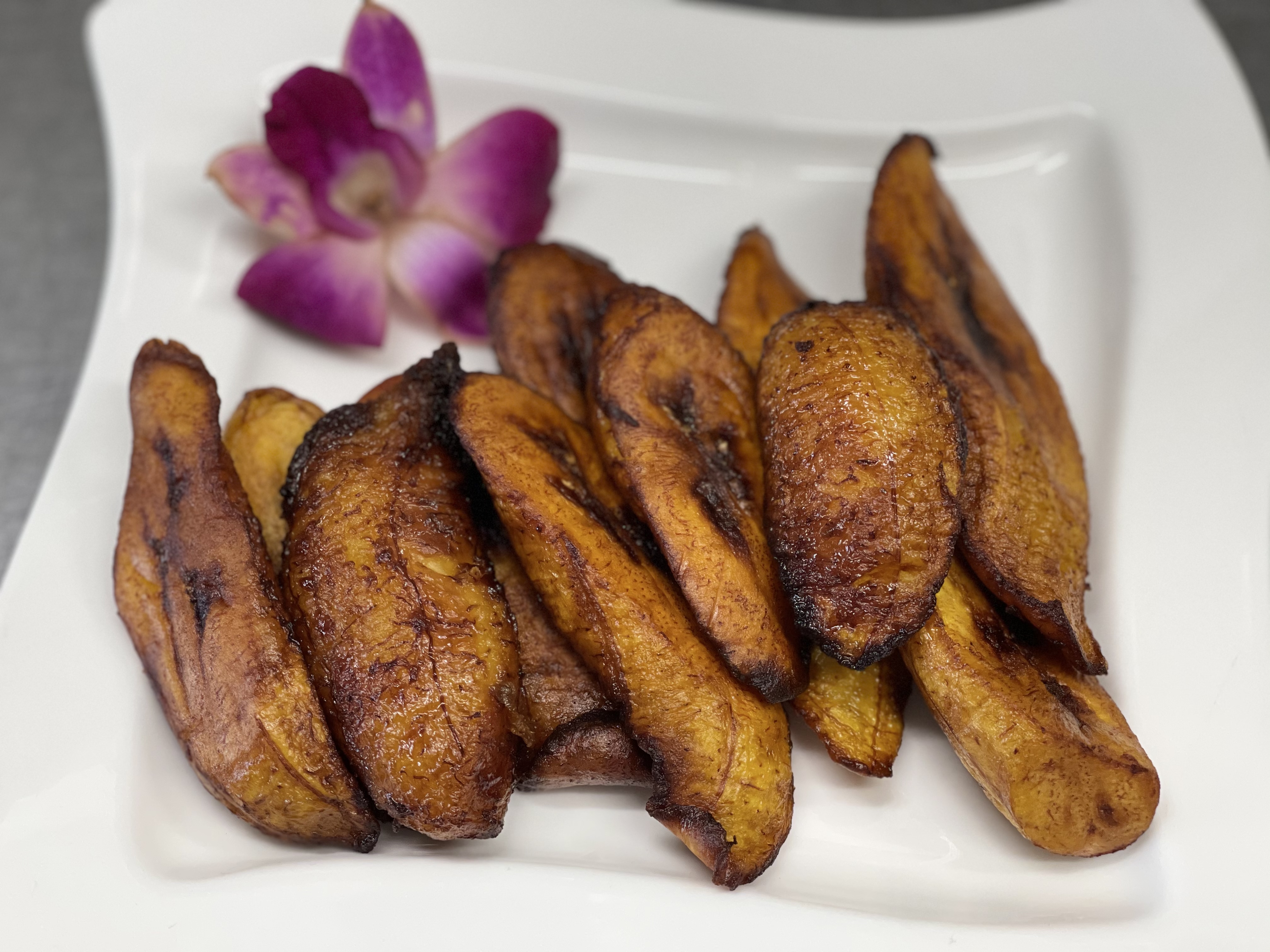 Order Plantains food online from One876 Caribbean Restaurant store, Chatsworth on bringmethat.com