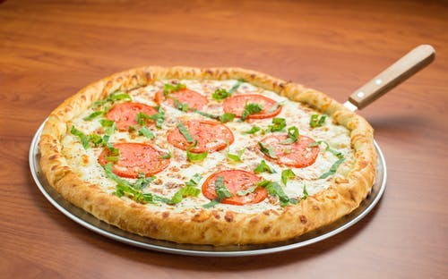 Order Margherita Pizza - Personal 10" food online from Native Grill & Wings store, Phoenix on bringmethat.com