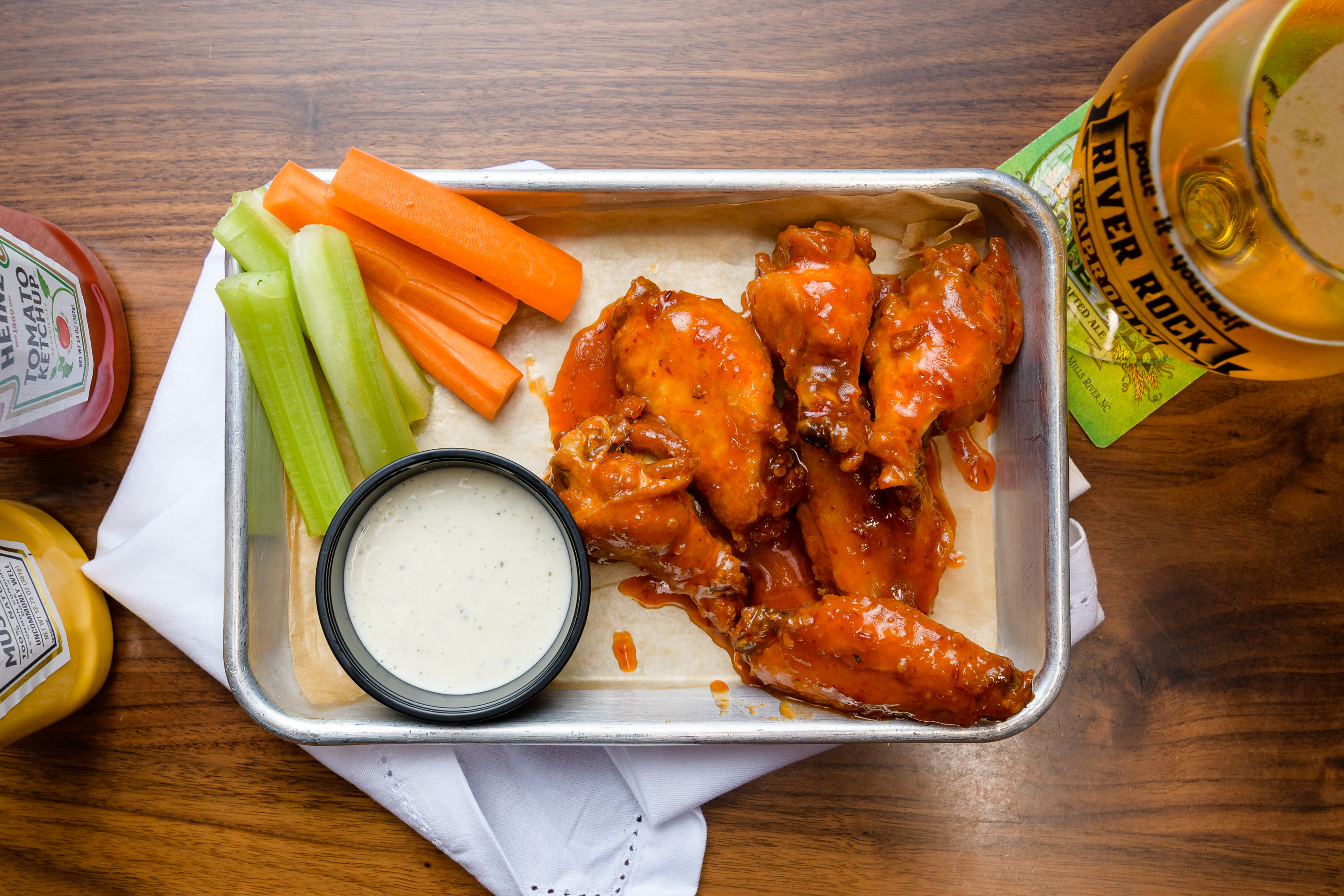 Order Wings with Orange Chilli Garlic Sauce food online from River Rock Taproom store, Sunnyvale on bringmethat.com