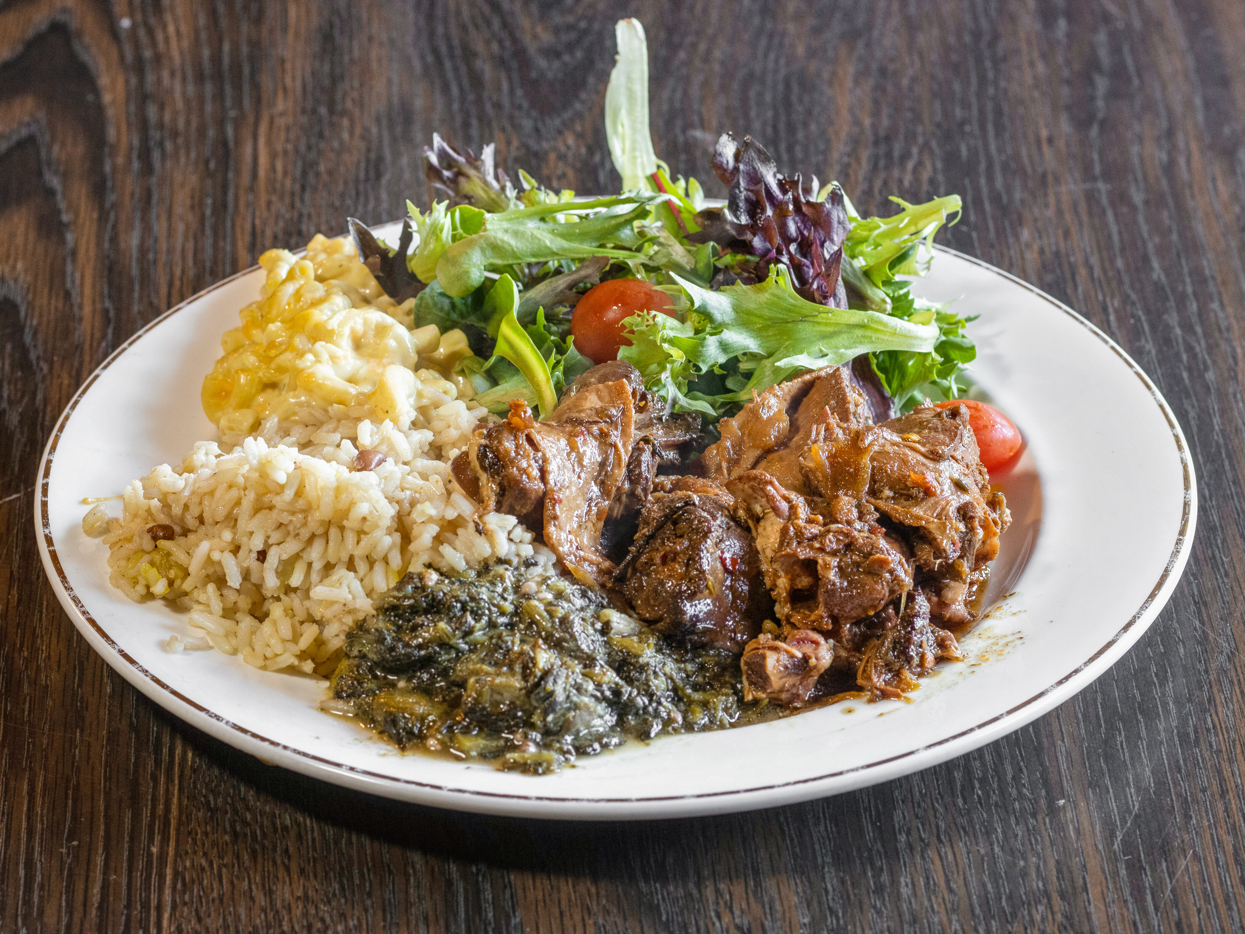 Order stew chicken dinner food online from The Callaloo Cafe And Bar store, Euclid on bringmethat.com